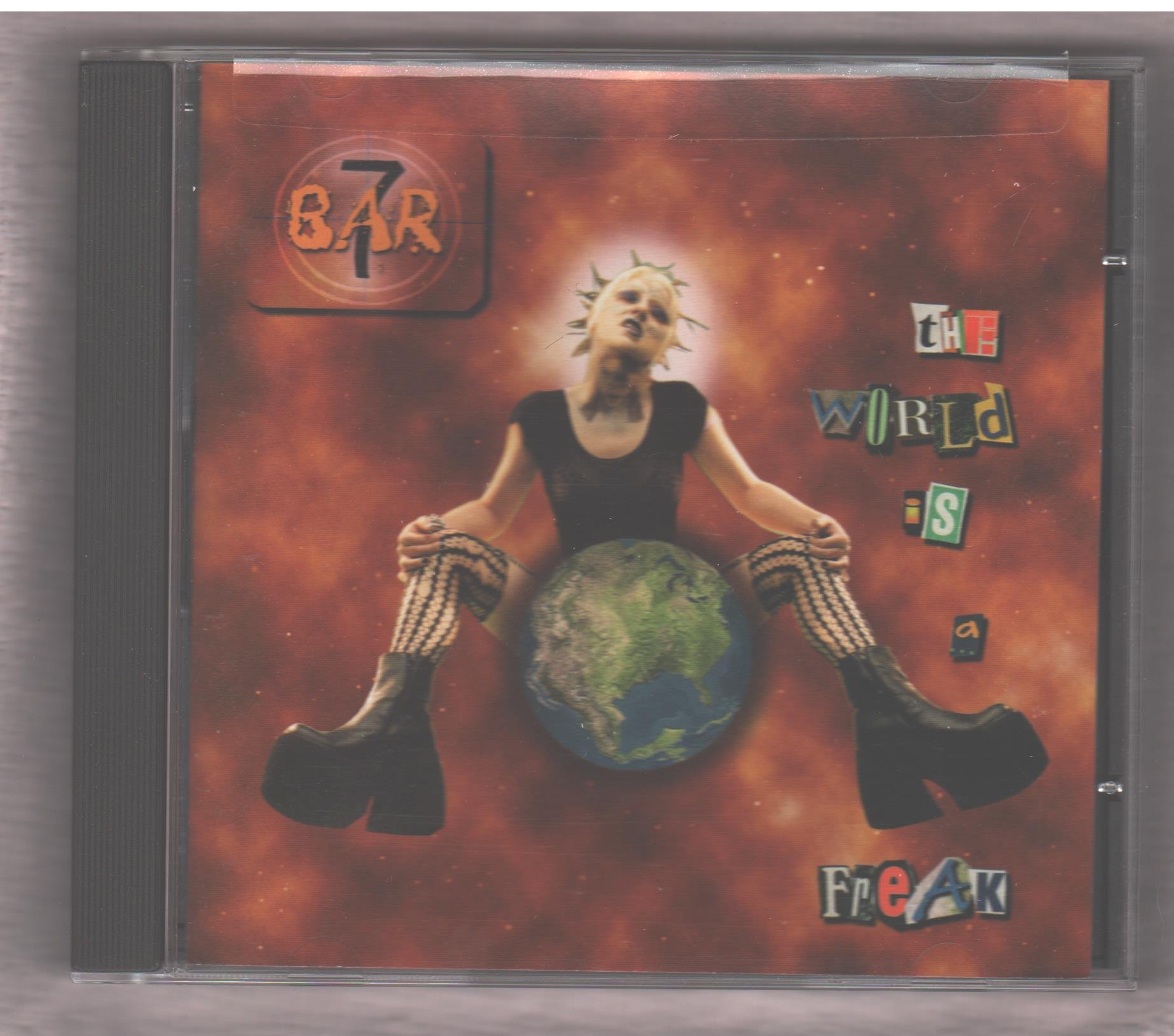 World Is a Freak [Audio CD]