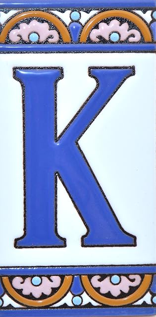 Letreros con numeros y letras en azulejo de ceramica policromada