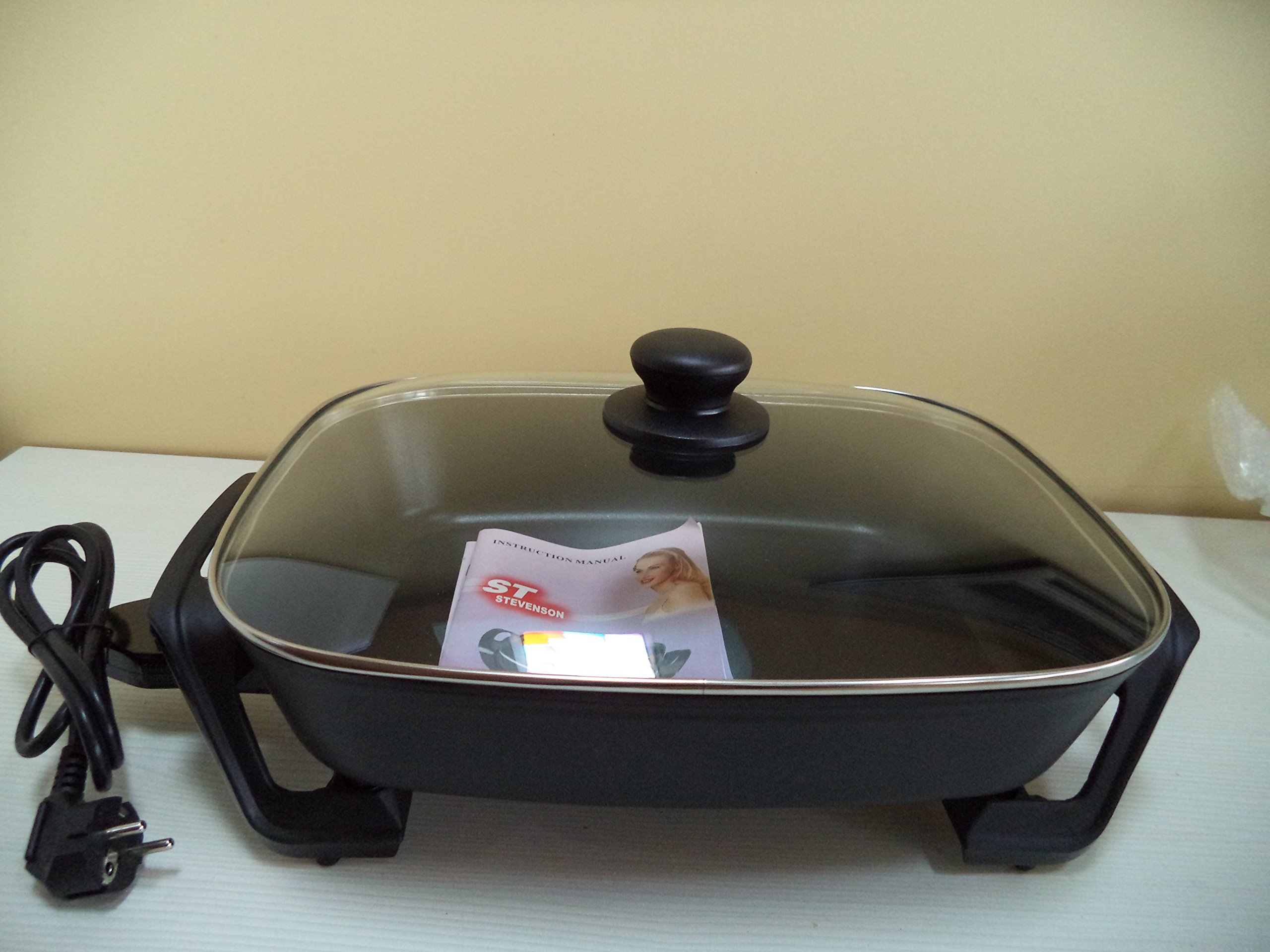 WOK eléctrico con regulador de temperatura, antiadherente, con tapa de cristal templado transparente. Medida del recipiente: 37x30x7 cms.