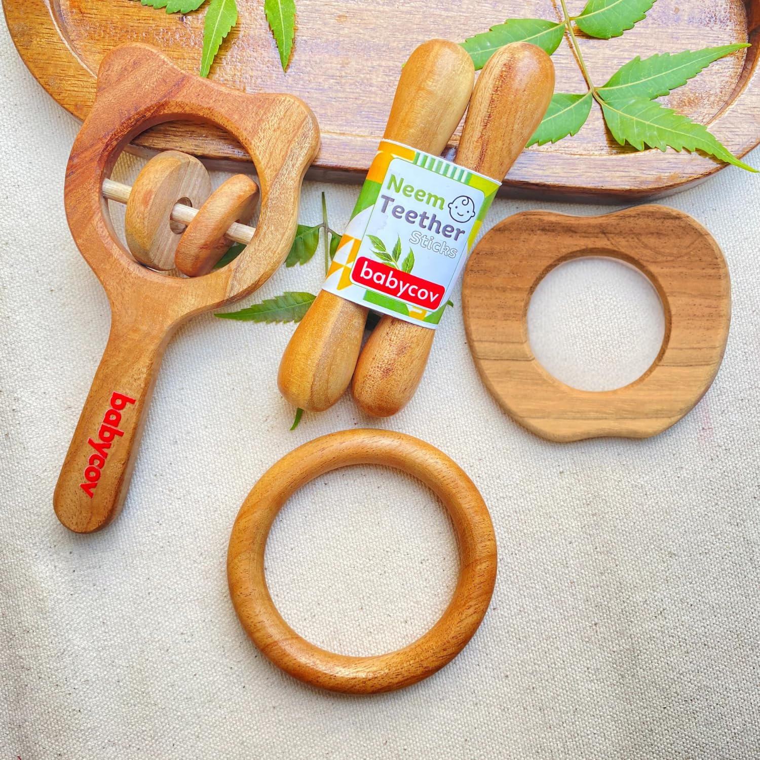 Babycov Natural Neem Wood Teether Set for Babies | Organic Teething Toy for Newborns (0–12 Months) | Eco-Friendly, BPA-Free, Wooden Teether Gift Combo for Infant Gifting & Pain Relief (Apple + Stick + Ring + HRattle)-image-26
