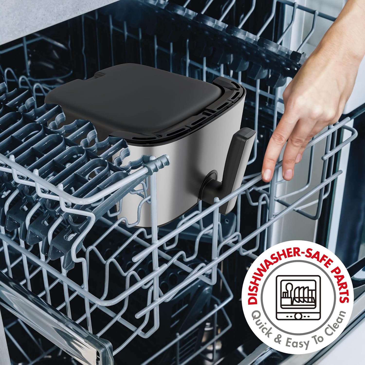 Air fryer basket being placed into a dishwasher