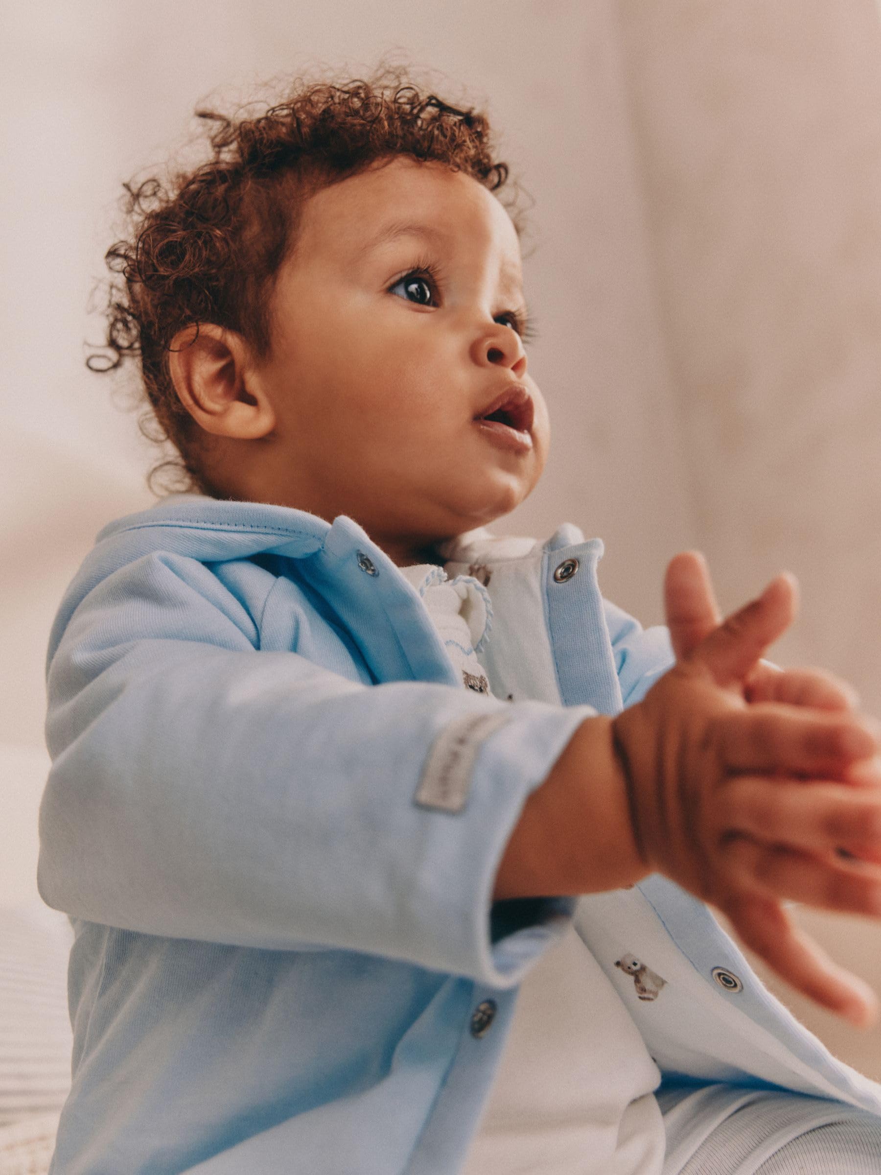NEXT Bebés niño Conjunto de 3 piezas de punto con chaqueta, body y leggings para bebé