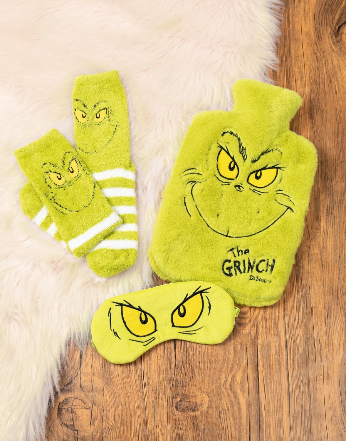 The Grinch Unisex Green Hot Water Bottle with Eye Mask and Socks | Fluffy Relaxation Set for Warmth and Sleep | Movie Merch