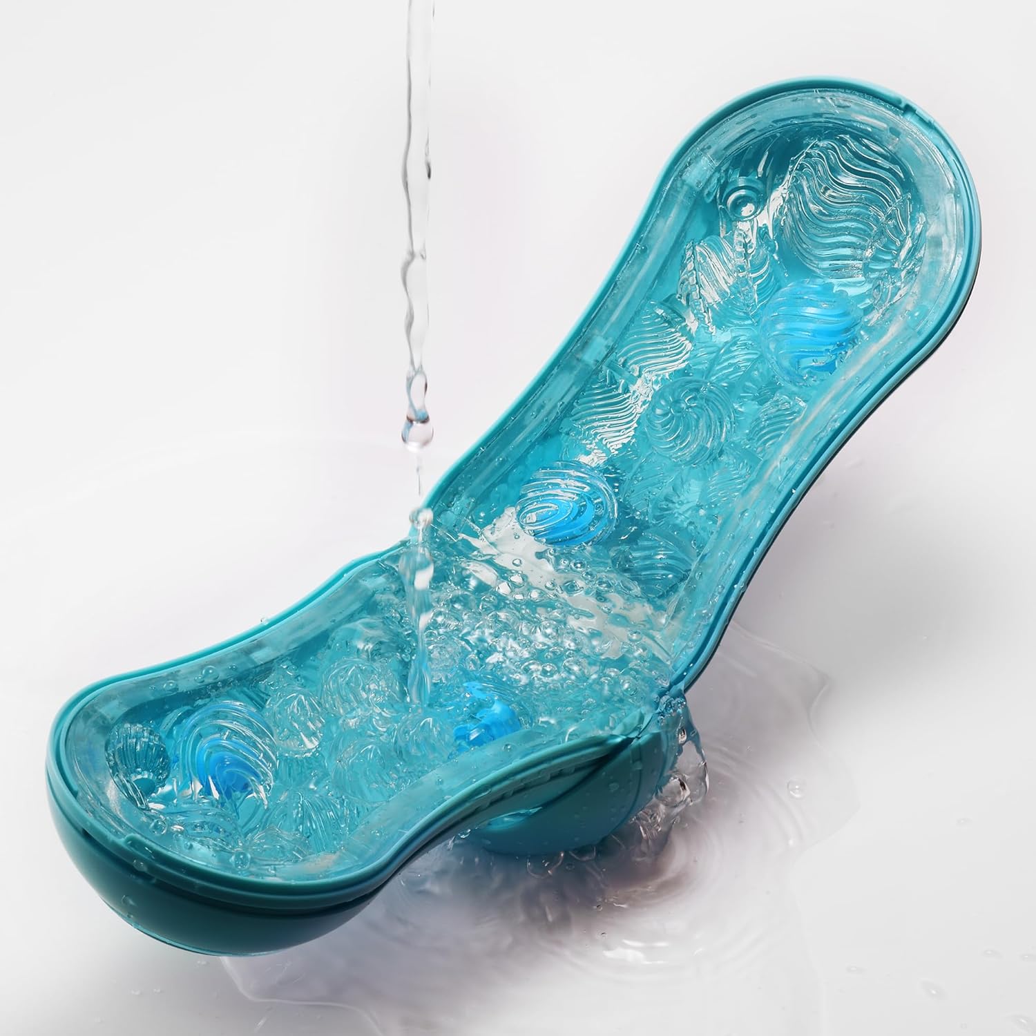 TENGA FLIP ORB Ocean Blue being rinsed under water