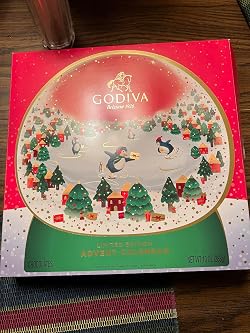 Amazon.com: Godiva Chocolatier 2023 Deluxe Snowglobe Advent Calendar -  Limited Edition 24-Piece Dark Milk and White Chocolate Assortment with  Almonds, Caramel, and Mousse - 16.2 Ounce Holiday Gift Box : Grocery &  Gourmet Food