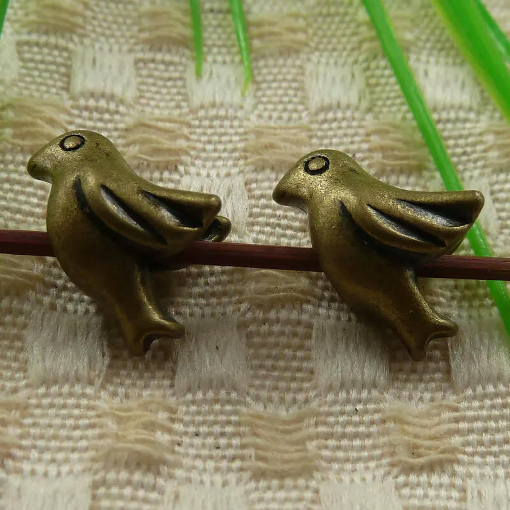 Espaciadores de pájaro en bronce S4346 de 16x11mm para abalorios y cuentas, 99 piezas