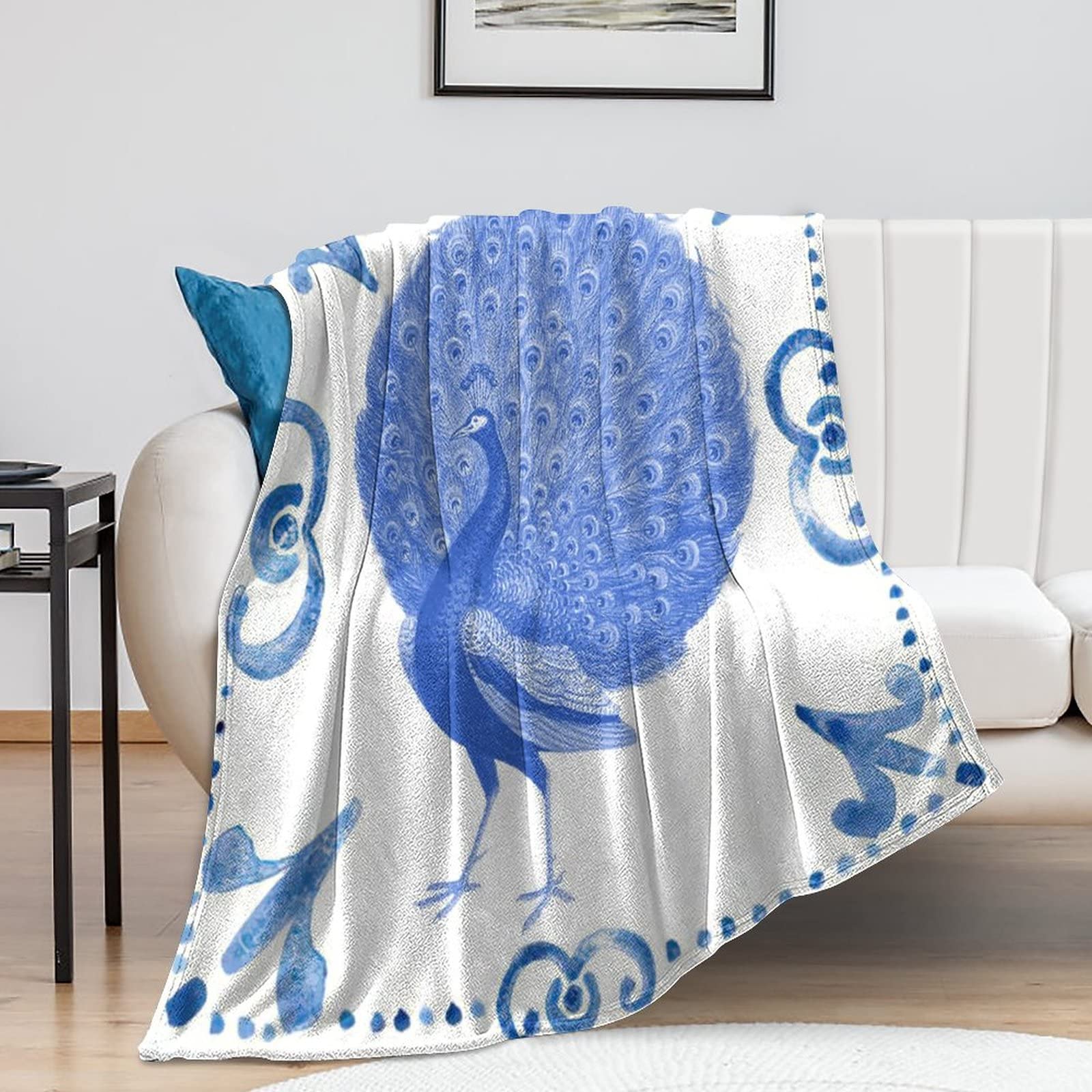 Plaid paon rétro chic en flanelle pour cocooning sur canapé et lit douillet