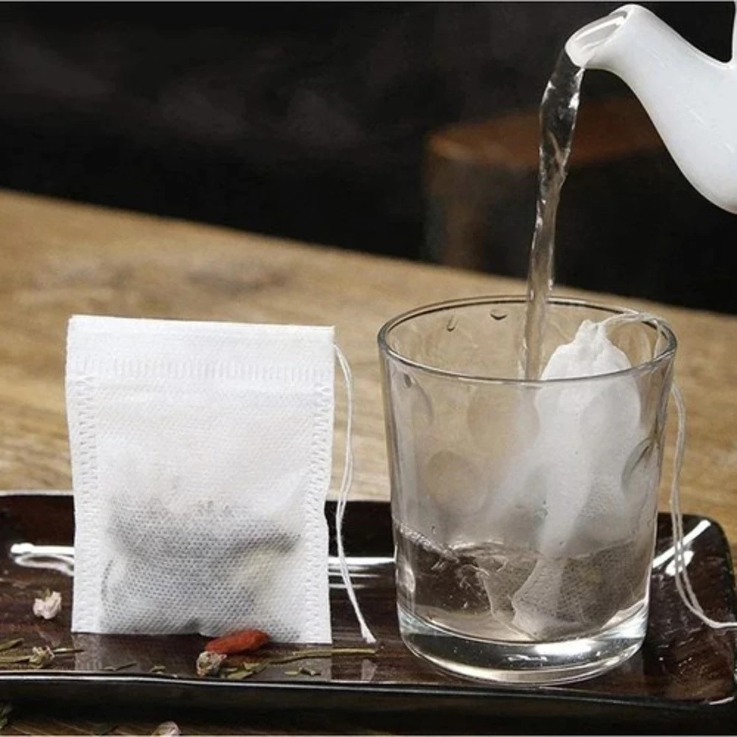 Bolsitas de té desechables con cordón – Juego de 100 bolsas de infusión de 10 x 8 cm – para té suelto, infusiones y hierbas – tela blanca no tejida