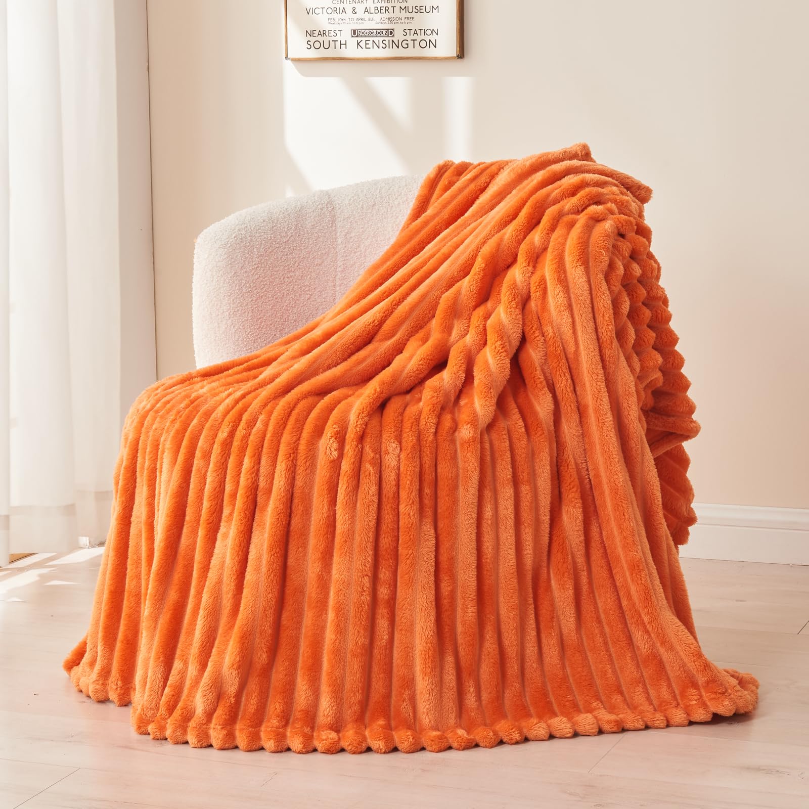 Photo 1 of NEWCOSPLAY Super Soft Fall Twin Blanket Orange Premium Silky Flannel Fleece 3D Ribbed Jacquard Lightweight Bed Blanket All Season Use (Orange Ribbed, Twin(60"x80"))