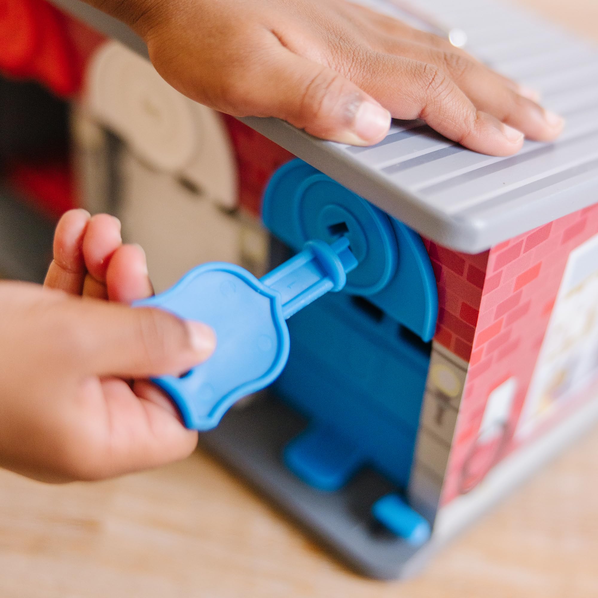 Melissa & Doug - Spielzeug Garage mit Schlüsseln und Rettungsfahrzeugen aus Holz, 7-teilig, für Kinder ab 3 Jahren
