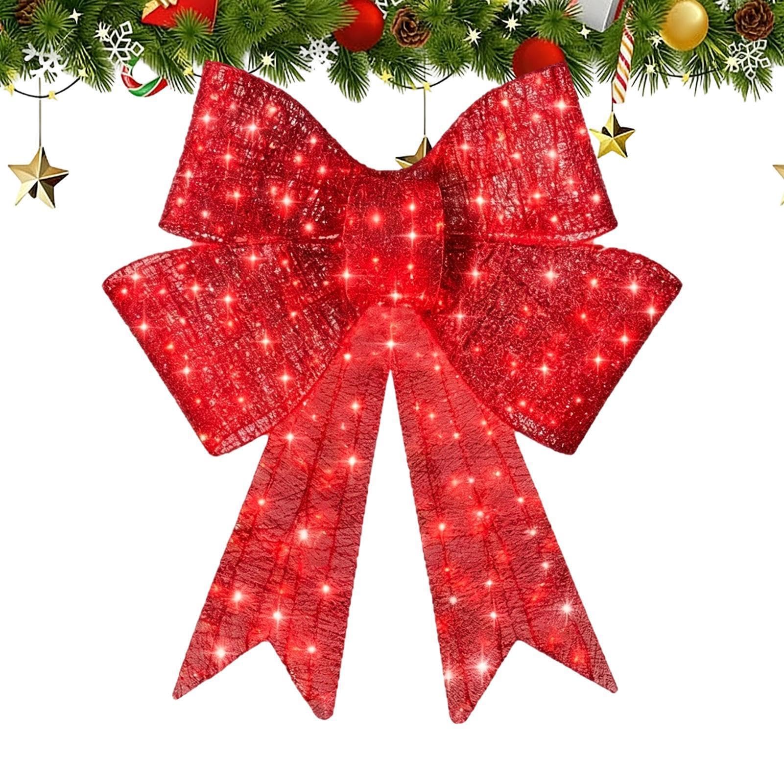 Weihnachtskranz Tür mit großer Weihnachtsdekoration in Schleifenform