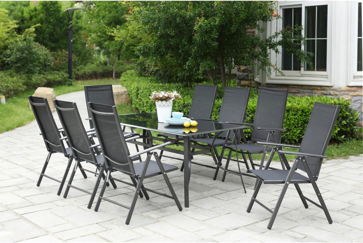 Concept Usine Rimini salon de jardin aluminium table verre 8 chaises pliables inclinables gris