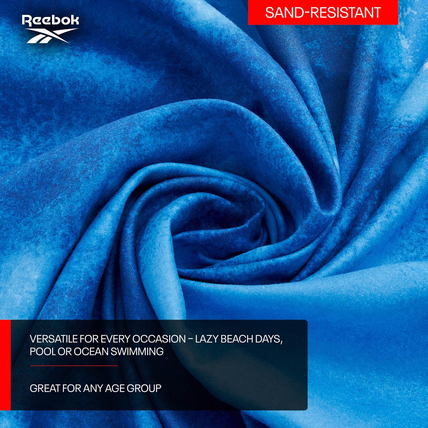 Reebok Toalla de Playa Microfibra Antiarena 90x180 cm | Secado Rápido, Ligera y Compacta con Bolsa | Toalla Grande para Gym, Piscina y Viaje, Diseño Azul Marino Nube
