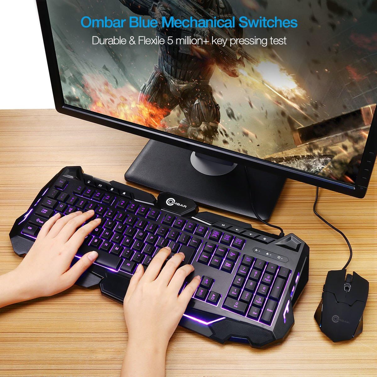 A person's hands typing on an OMBAR Gaming Keyboard with purple LED backlighting, next to a gaming mouse and monitor.