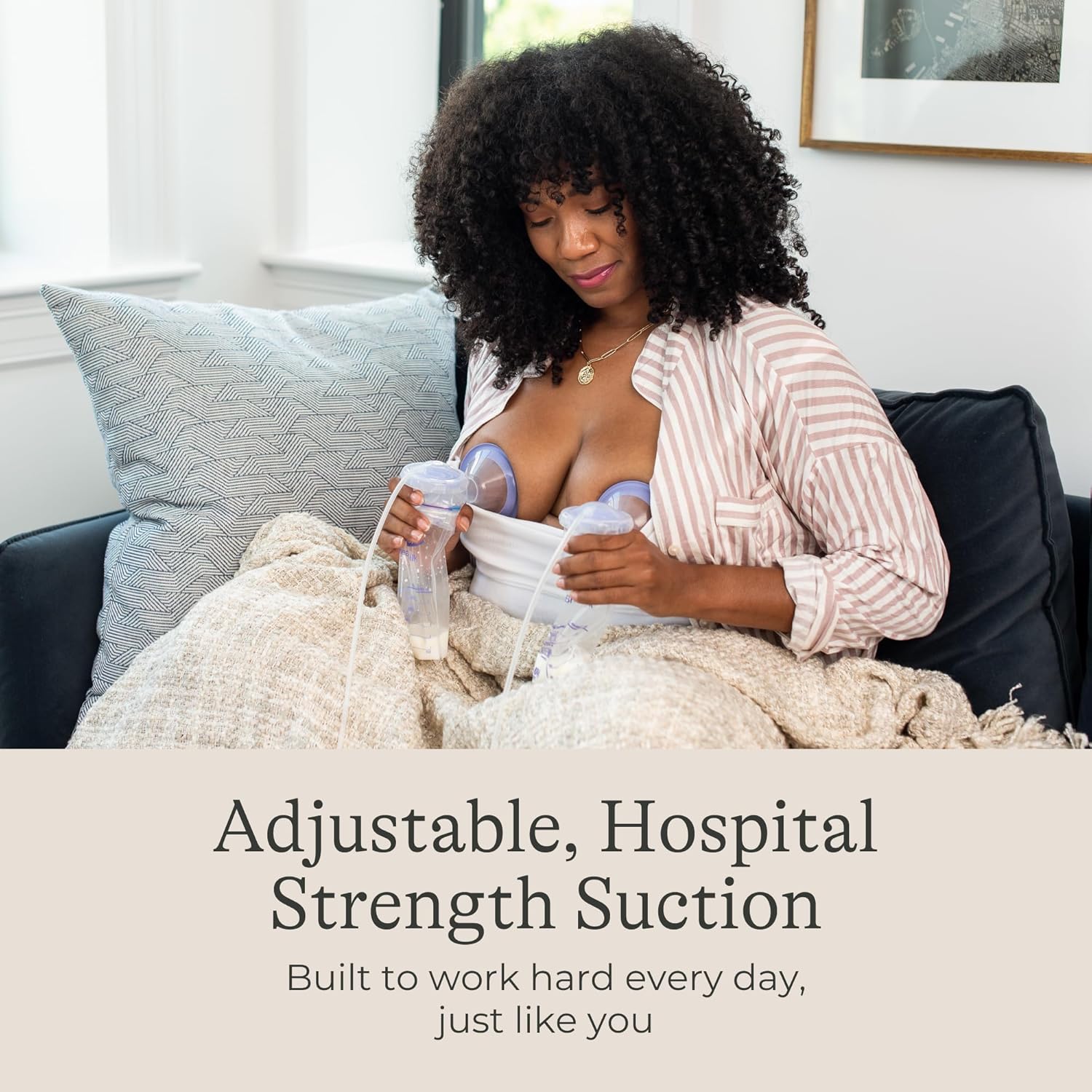 Woman comfortably using the Lansinoh Signature Pro Double Electric Breast Pump