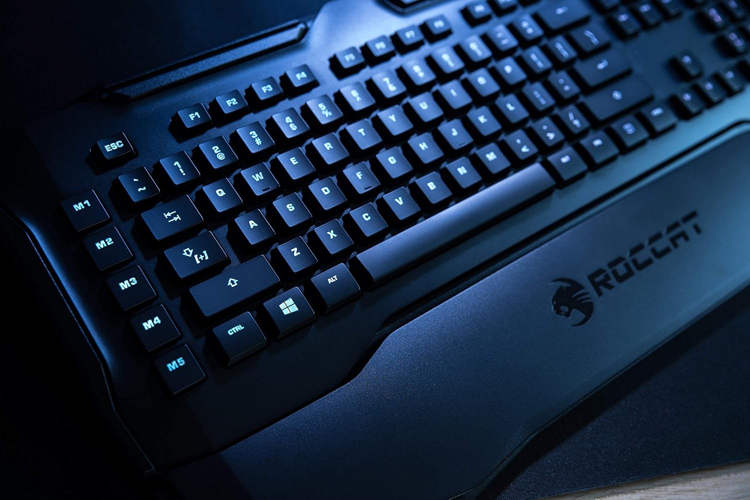 Roccat Horde AIMO keyboard with detachable palm rest attached, showing blue RGB lighting.