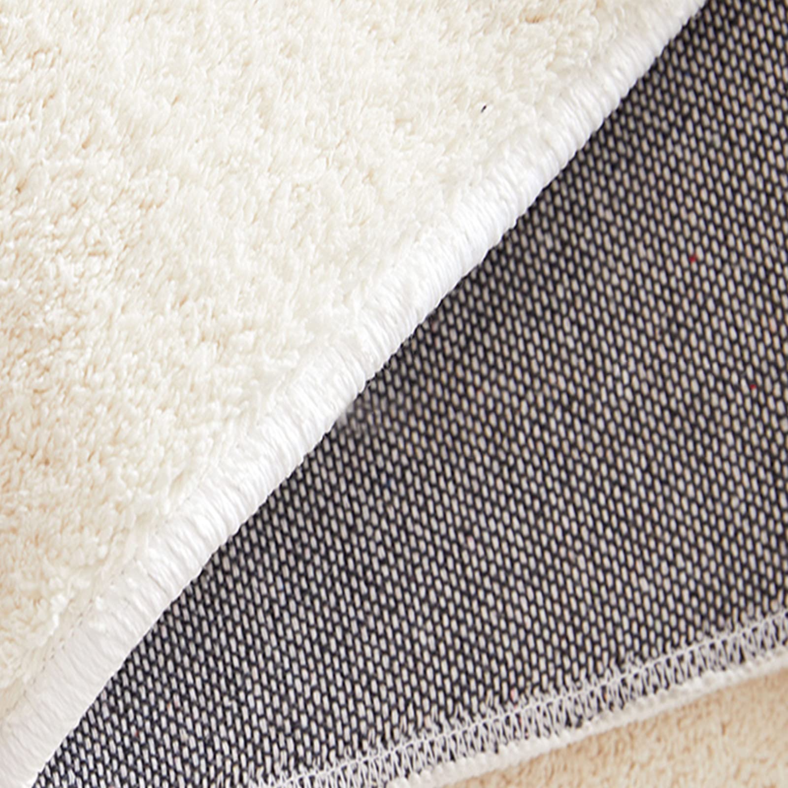Tapis salle de bain incurvé mémoire de forme galet 45x100cm (2 modèles