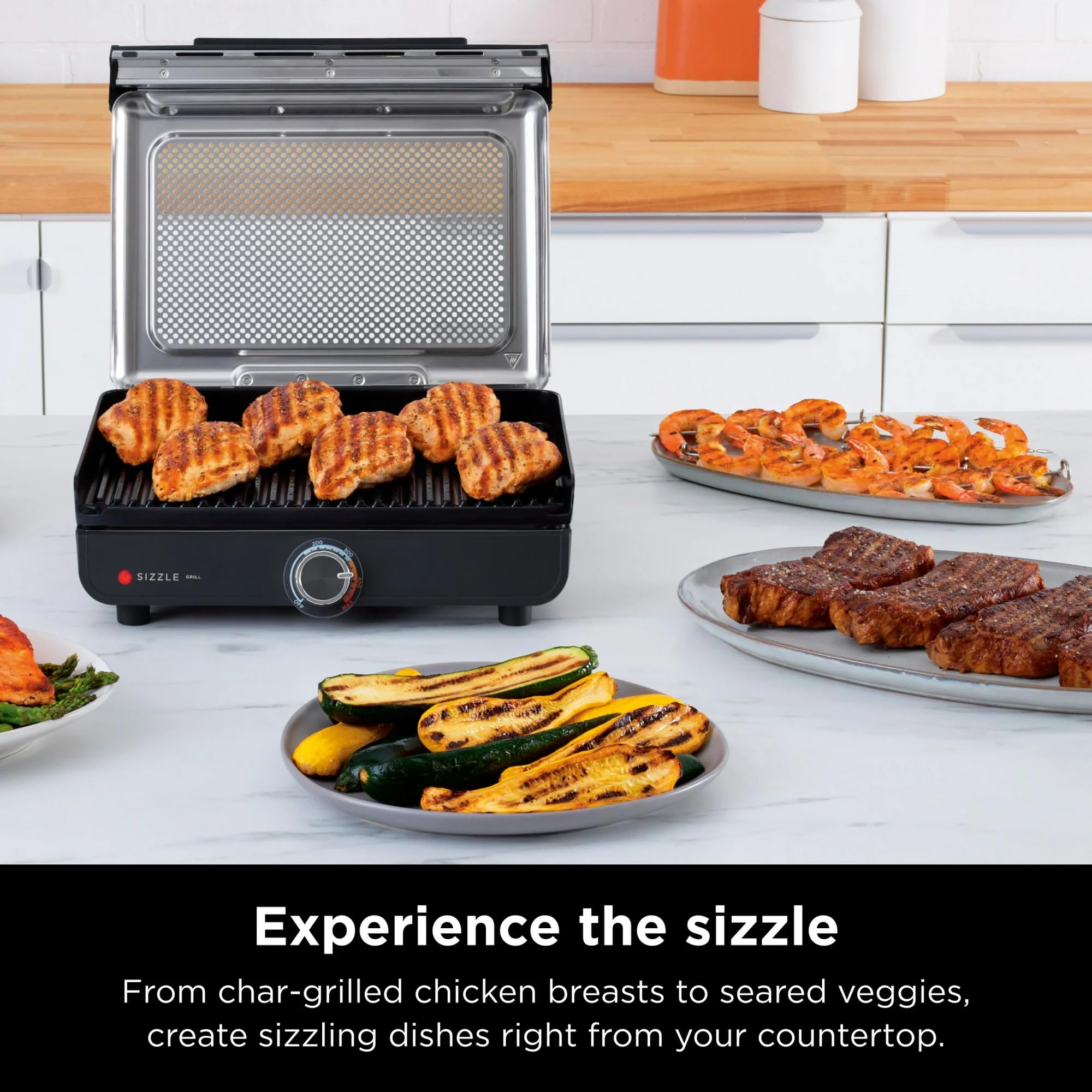 Ninja Sizzle GR100 Smokeless Indoor Grill, 500°F High Heat Kitchen Grill with Nonstick 14-Inch Plate, Low-Smoke Technology, Edge-to-Edge Heating, Family-Sized Capacity, Countertop Cooking Tool