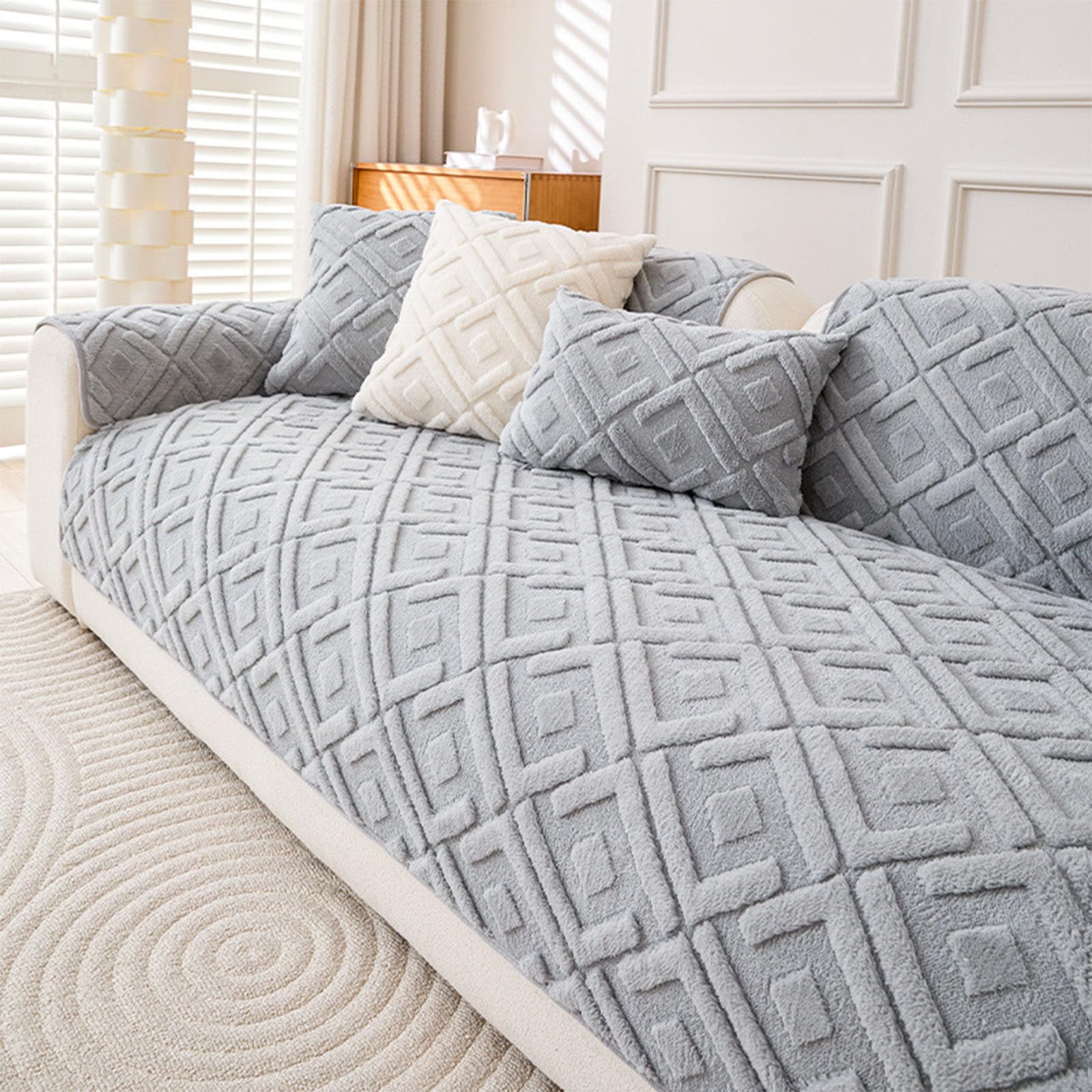 Housse de canapé douillette en peluche pour un salon cocooning en hiver