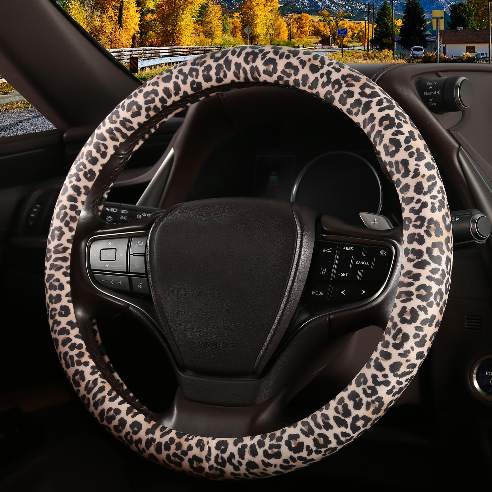 Funda para volante SthExtra con estampado de leopardo y anillo interior de silicona. Piel de silicona no tóxica e inodora con estampado de guepardo que no se decolora. Universal, de 14,5 a 15 pulgadas. Estampado de leopardo.