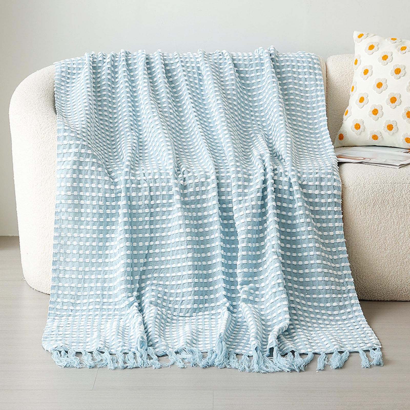 Couverture tricotée anti-froid pour protéger votre canapé avec style