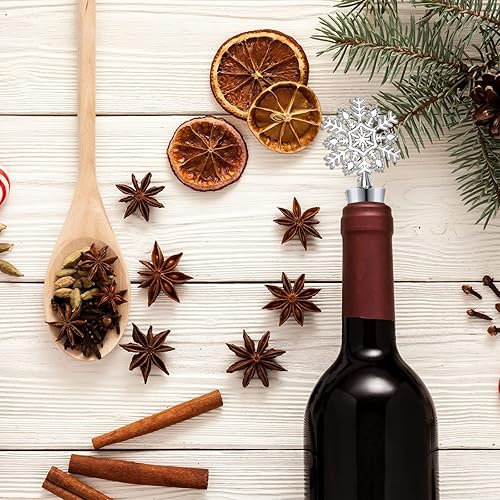 Miniatura 5 de Whaline Tapón de metal para botellas de vino con diseño de copo de nieve de 4 piezas, tapón decorativo de Navidad, suministros para fiestas para