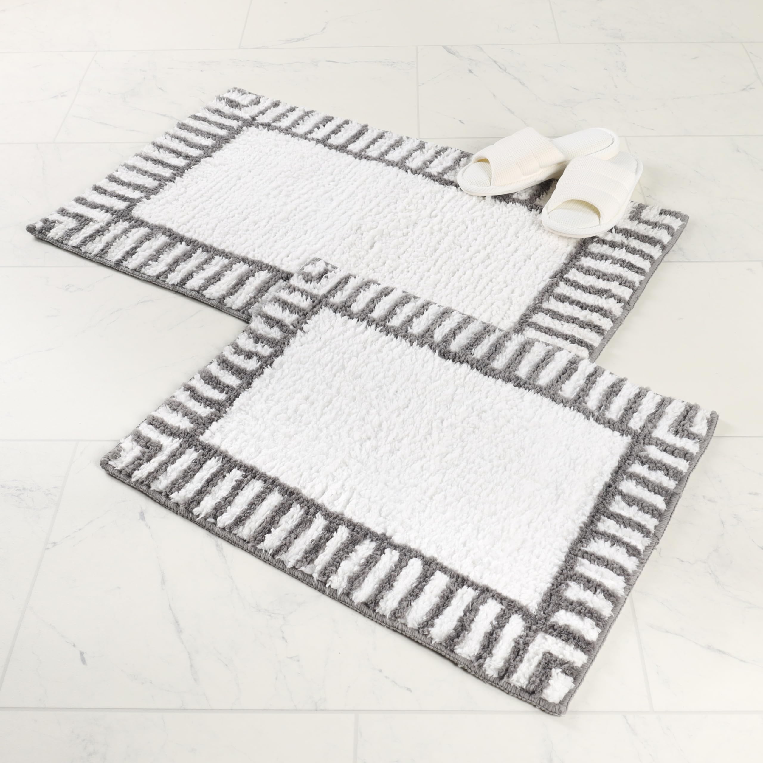 Tapis de bain antidérapants Inaya haut de gamme au tissage touffeté moelleux