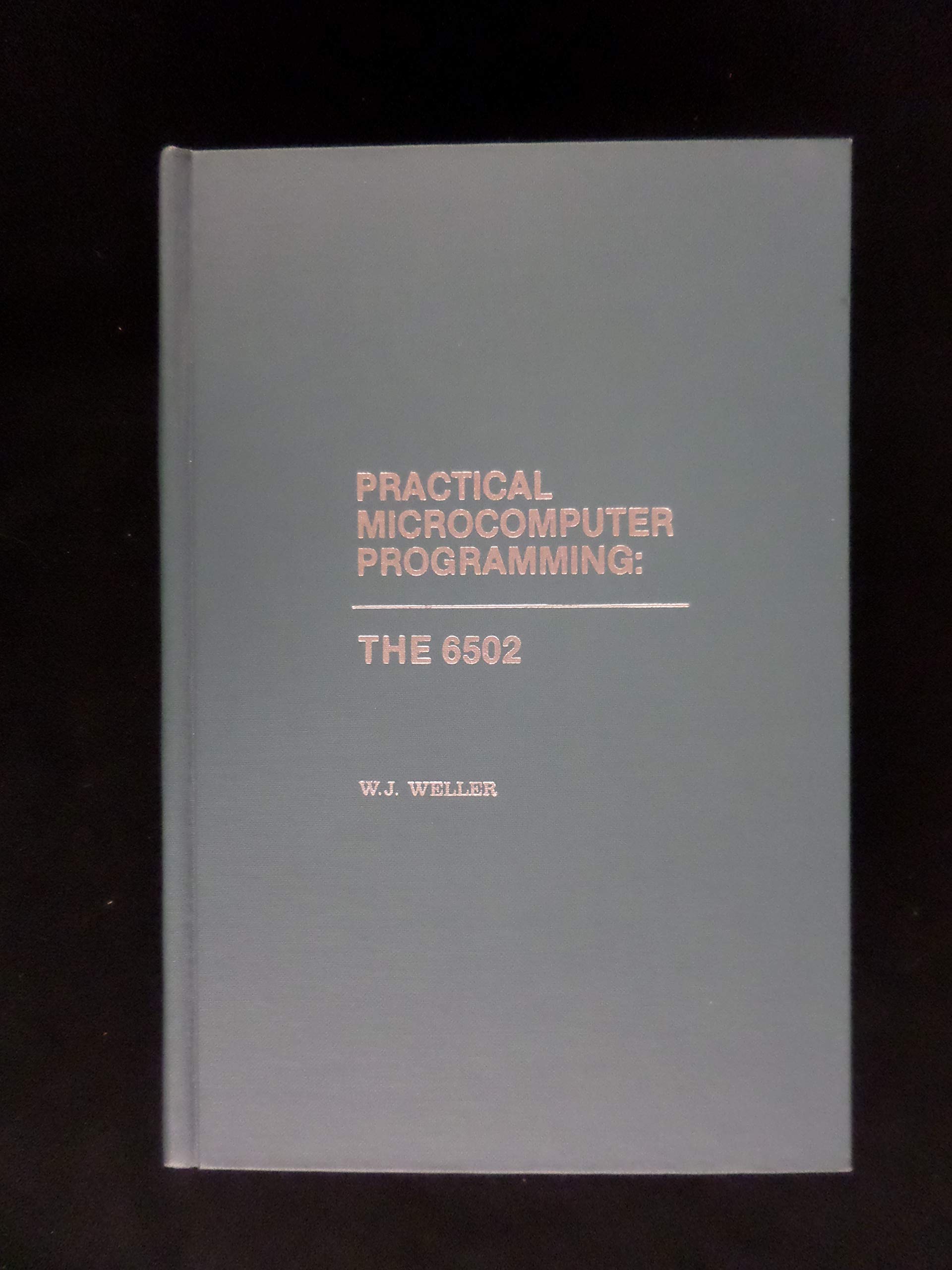Practical microcomputer programming: The 6502