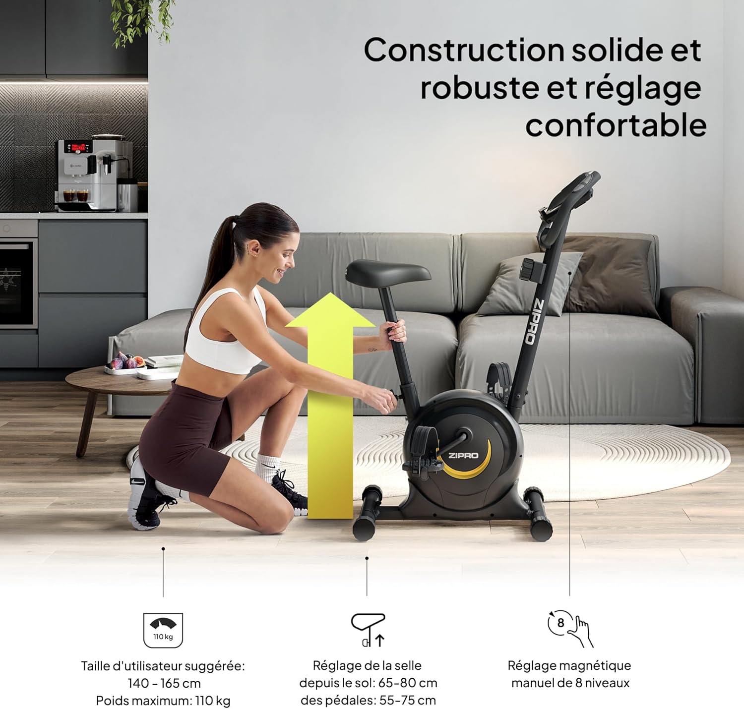 Person adjusting the seat height of the fitness bike