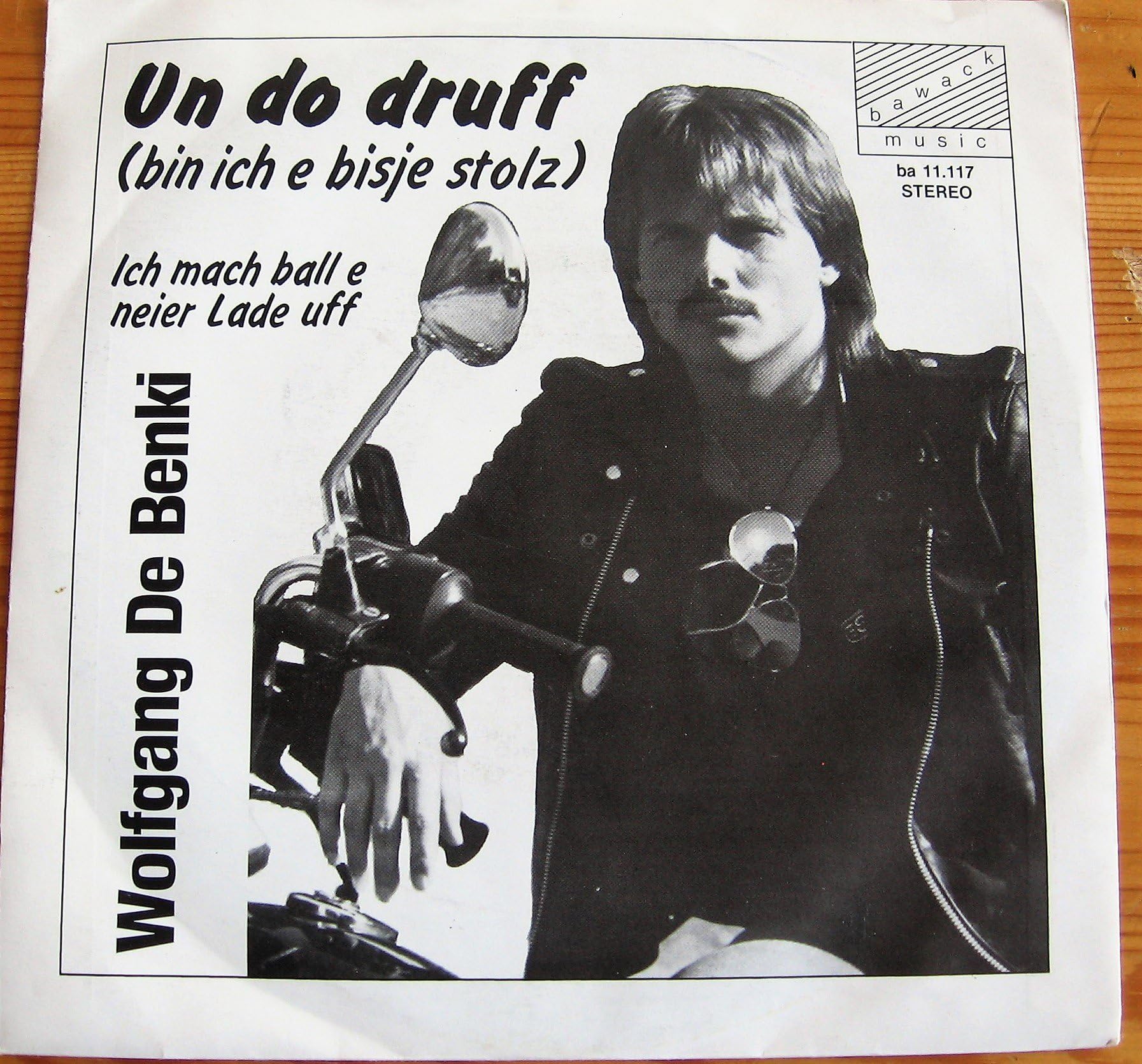 Wolfgang De Benki / Un do druff (bin ich e bisje stolz) / Ich mach ball e neier Lade uff / 1983 / Bildhülle / bawack music # ba 11.117 / Deutsche Pressung / 7" Vinyl Single Schallplatte