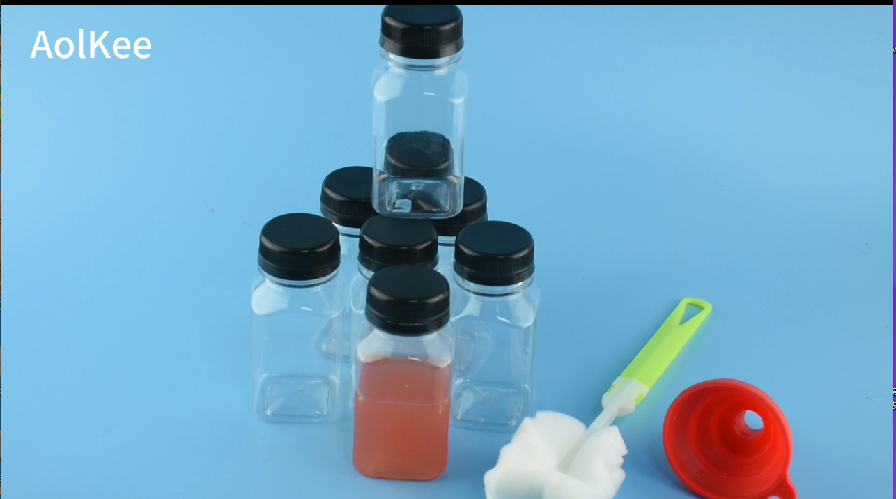 Lot de 12 bouteilles de jus en plastique de 340 ml avec bouchons Lot de 12 bouteilles de jus en plastique de 340 ml avec bouchons