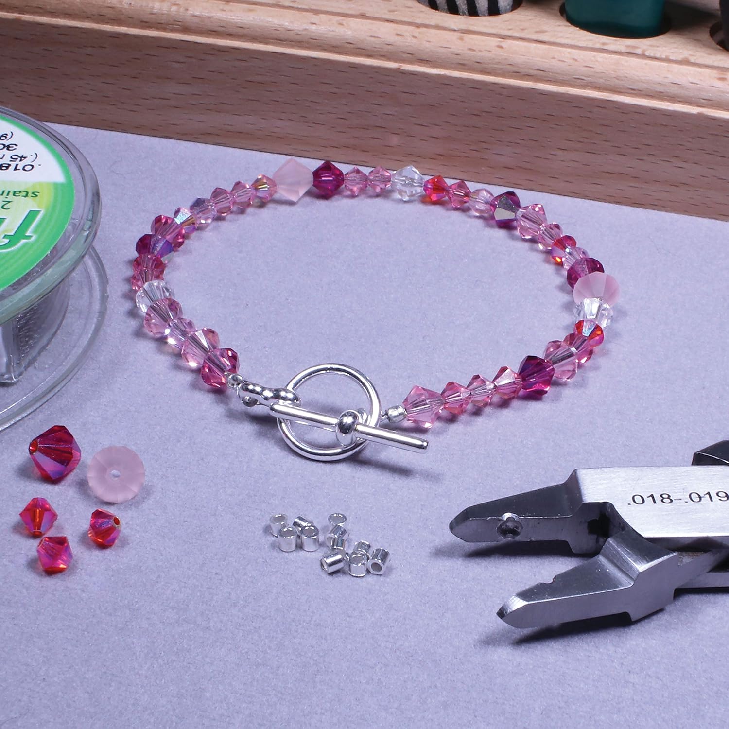 The Beadsmith Magical Crimper Kit - Includes Crimp Forming Pliers, 500 2x2 mm Crimp Tubes in Assorted Colors, and 21-Strand Flex-Rite Wire