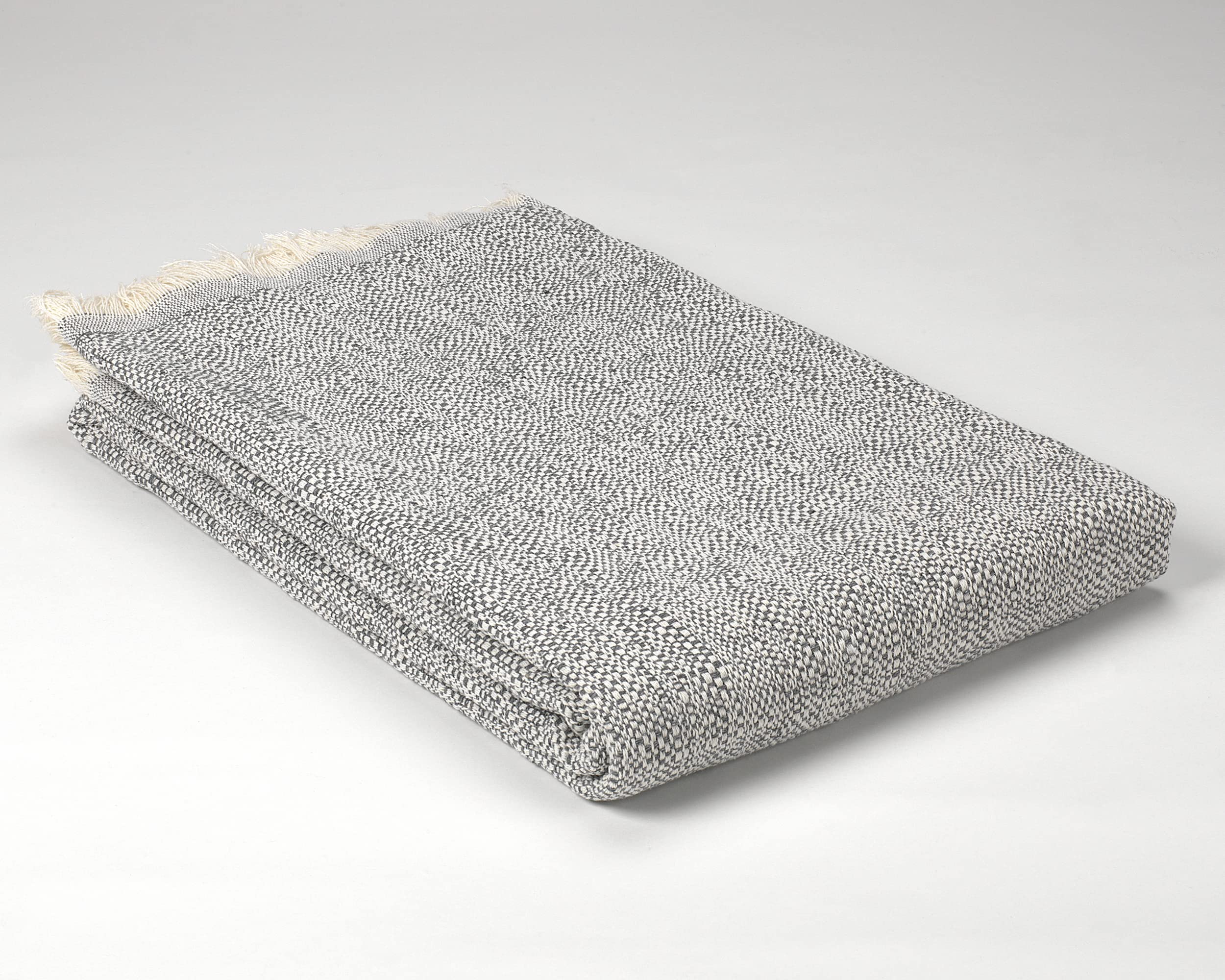 Colcha multiusos Atika gris haut de gamme pour protection durable de canapé et lit