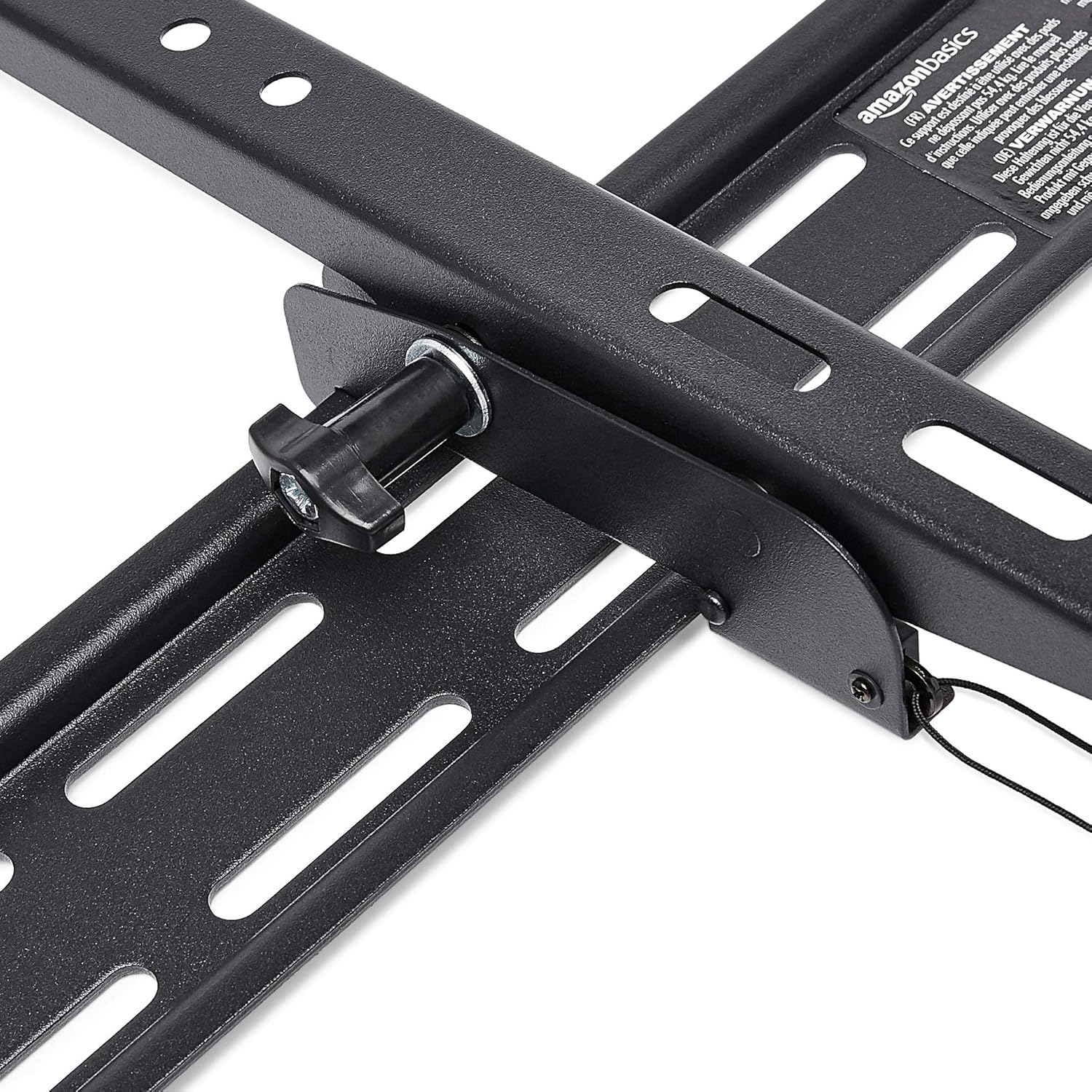 Close-up of the tilt adjustment knob and mechanism on the Amazon Basics TV wall mount.