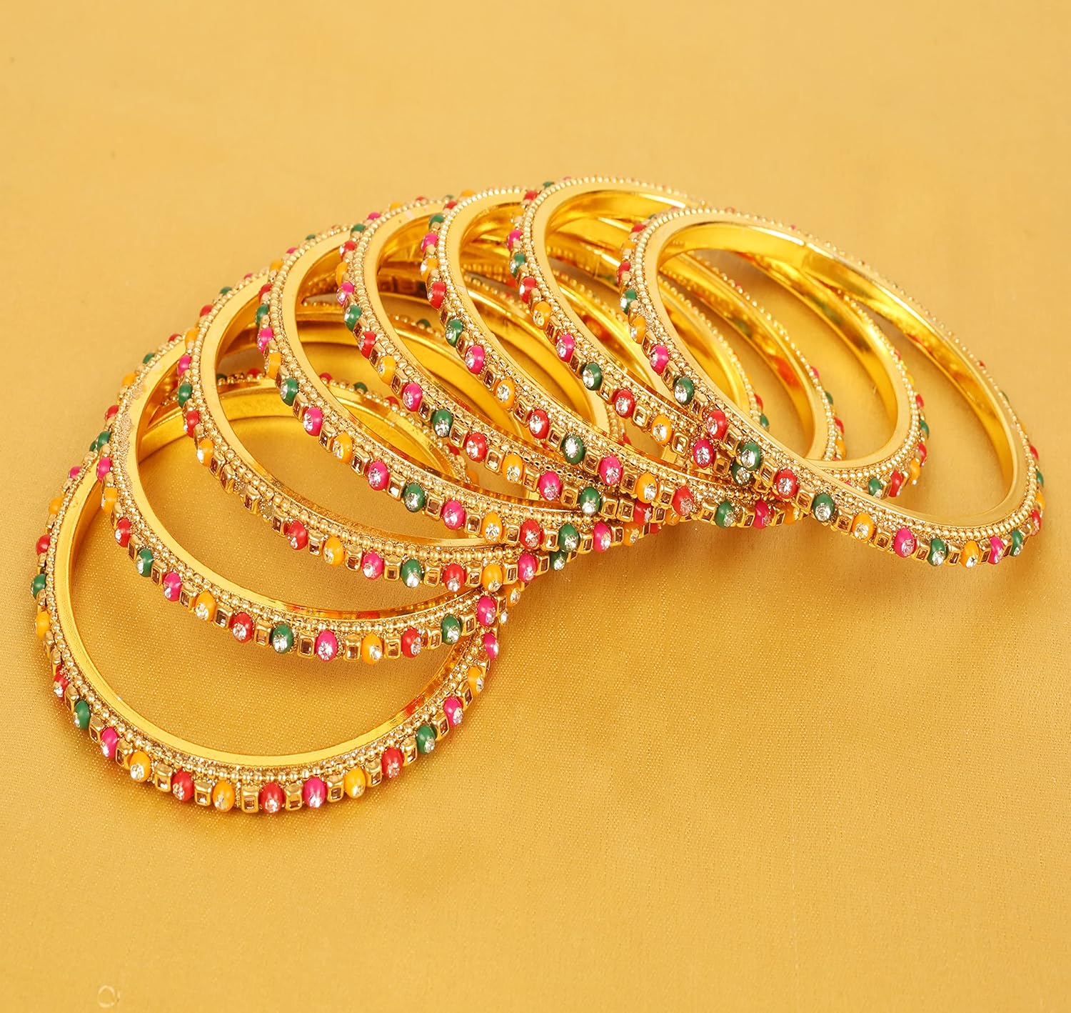 Touchstone "Colorful Bangle Collection Indian Bollywood Rhinestones and Plain Golden Designer Jewelry Bangle Bracelets in Antique Gold Tone for Women.