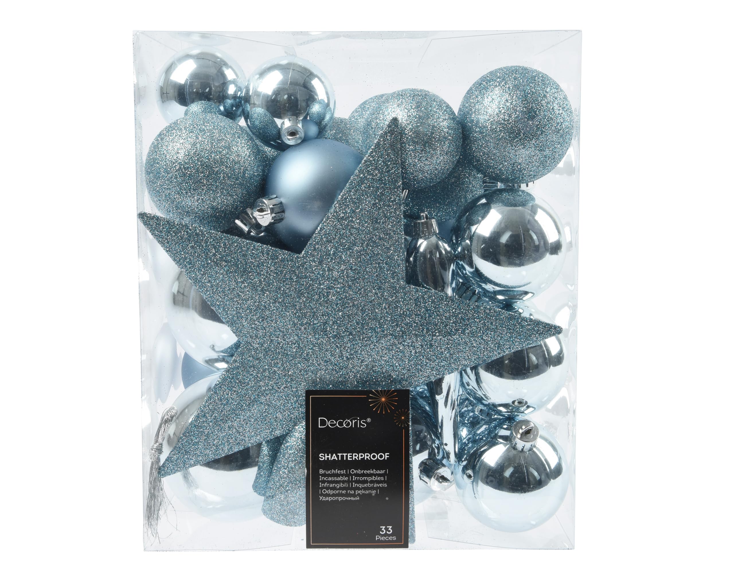 Boules de Noël et pointe de sapin pour ambiance givrée