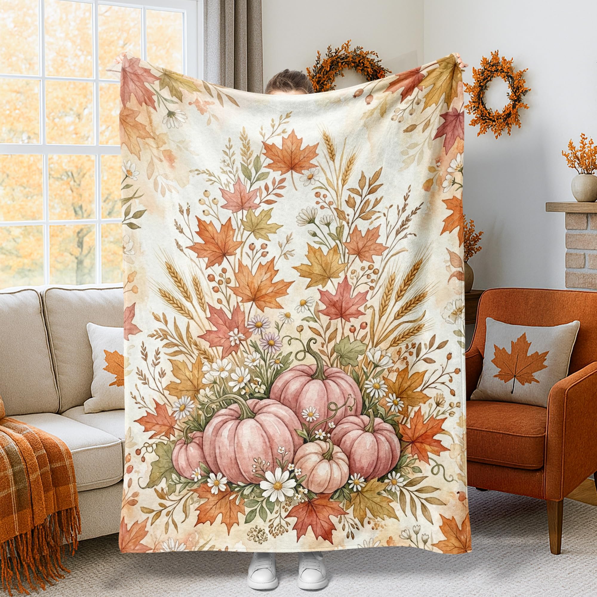 Couverture citrouilles et feuilles d'érable pour cocooning d'automne au salon