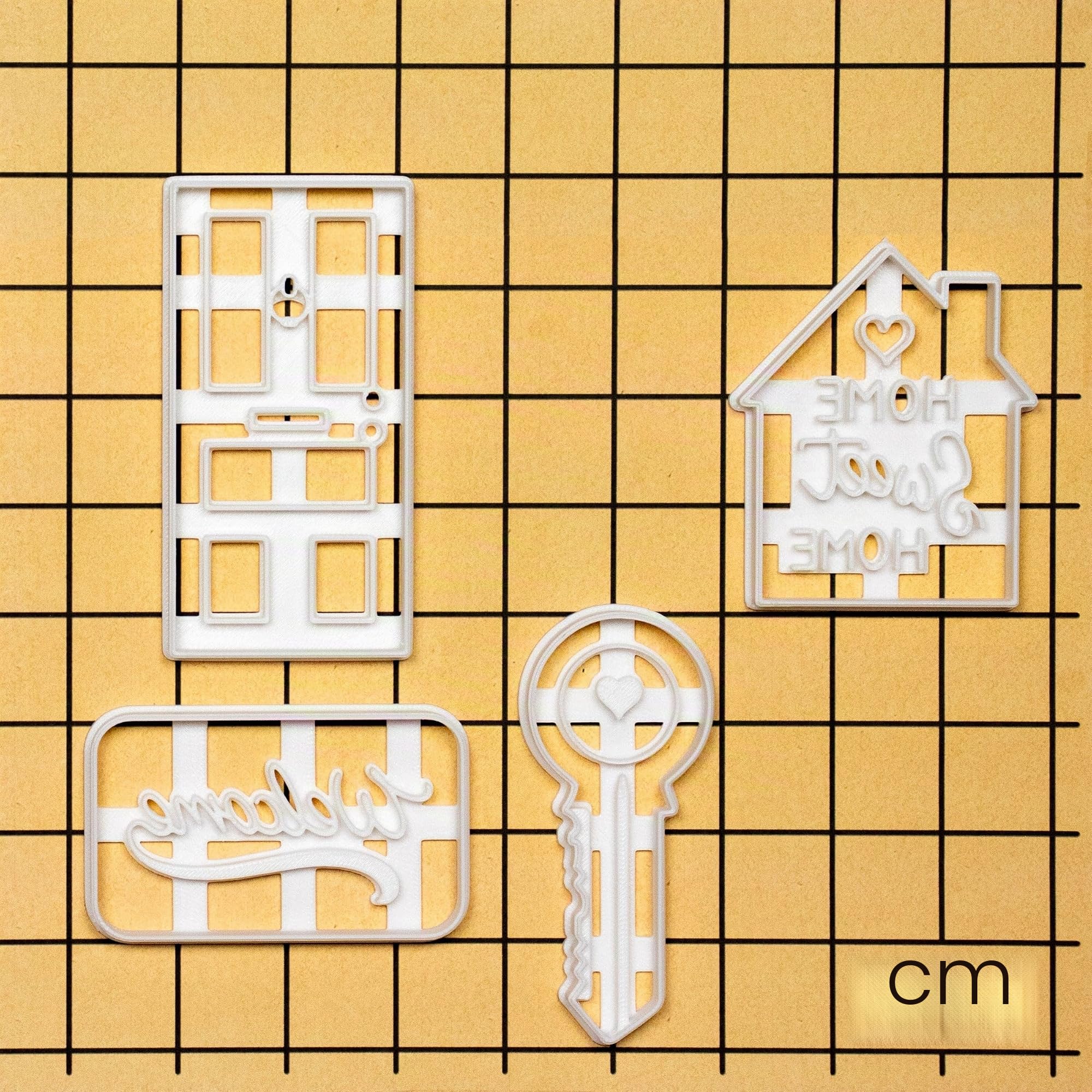 set de 4 emporte-pièces pour la pendaison de crémaillère (home sweet home, porte de la maison, clé de la maison et tapis de bienvenue), 4 pièces