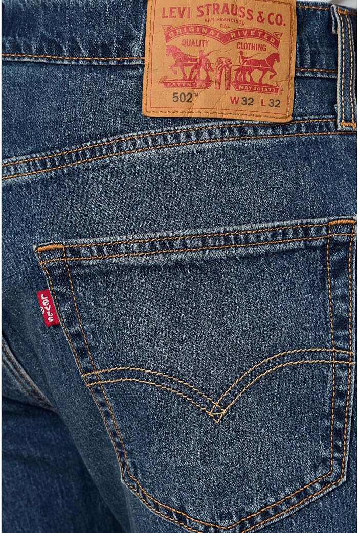 Levi's® Мужские зауженные книзу джинсы Levi's 502, охлаждающие, цвет: Тёмно-синий — фото 4