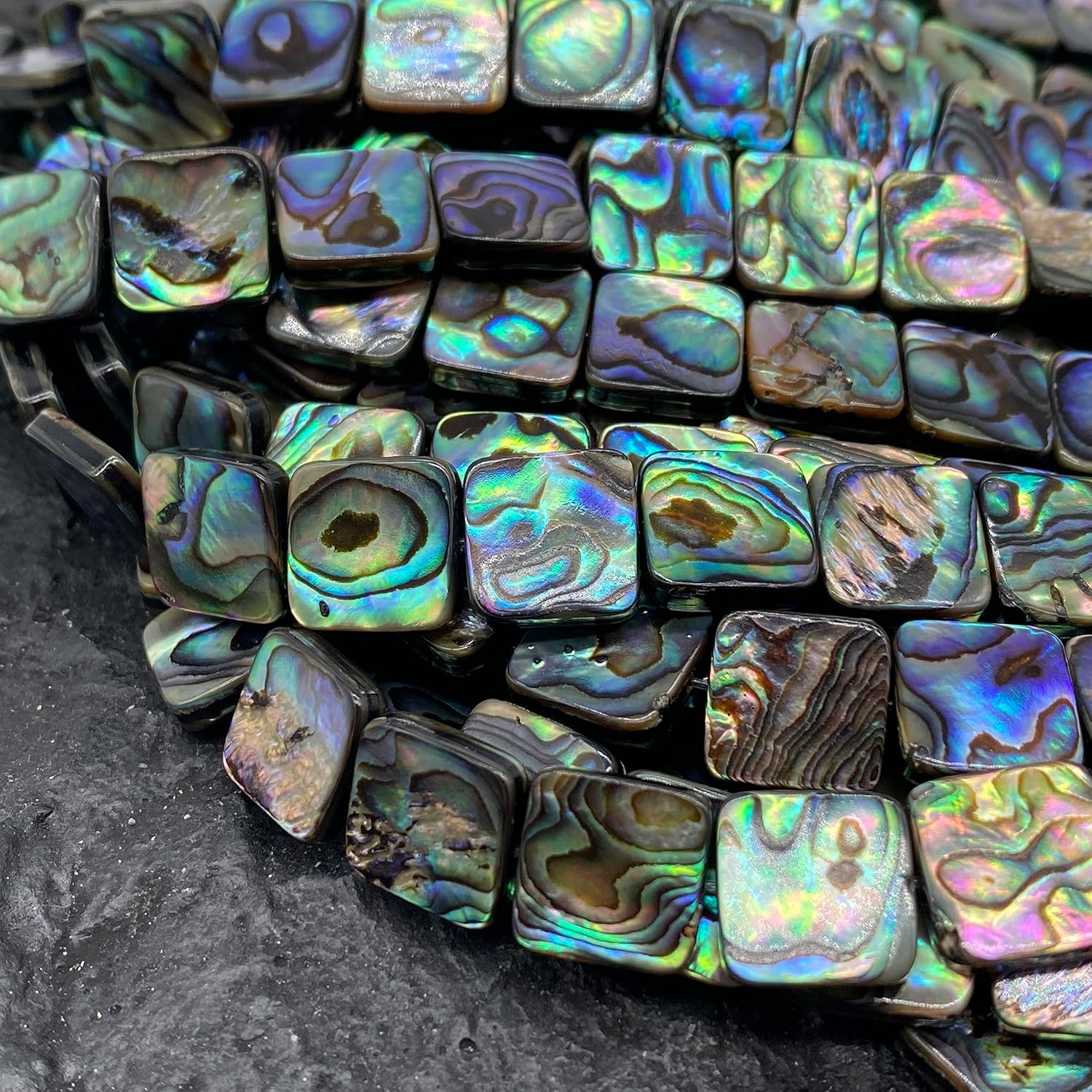ABCGEMS 39Pcs AAA Abalone Paua Shell Beads from Coastal New Zealand (Rich Iridescent Depth) Symmetrical Double-Sided Matrix Pattern - Mirror-Polished - Full Strand - Square 10mm