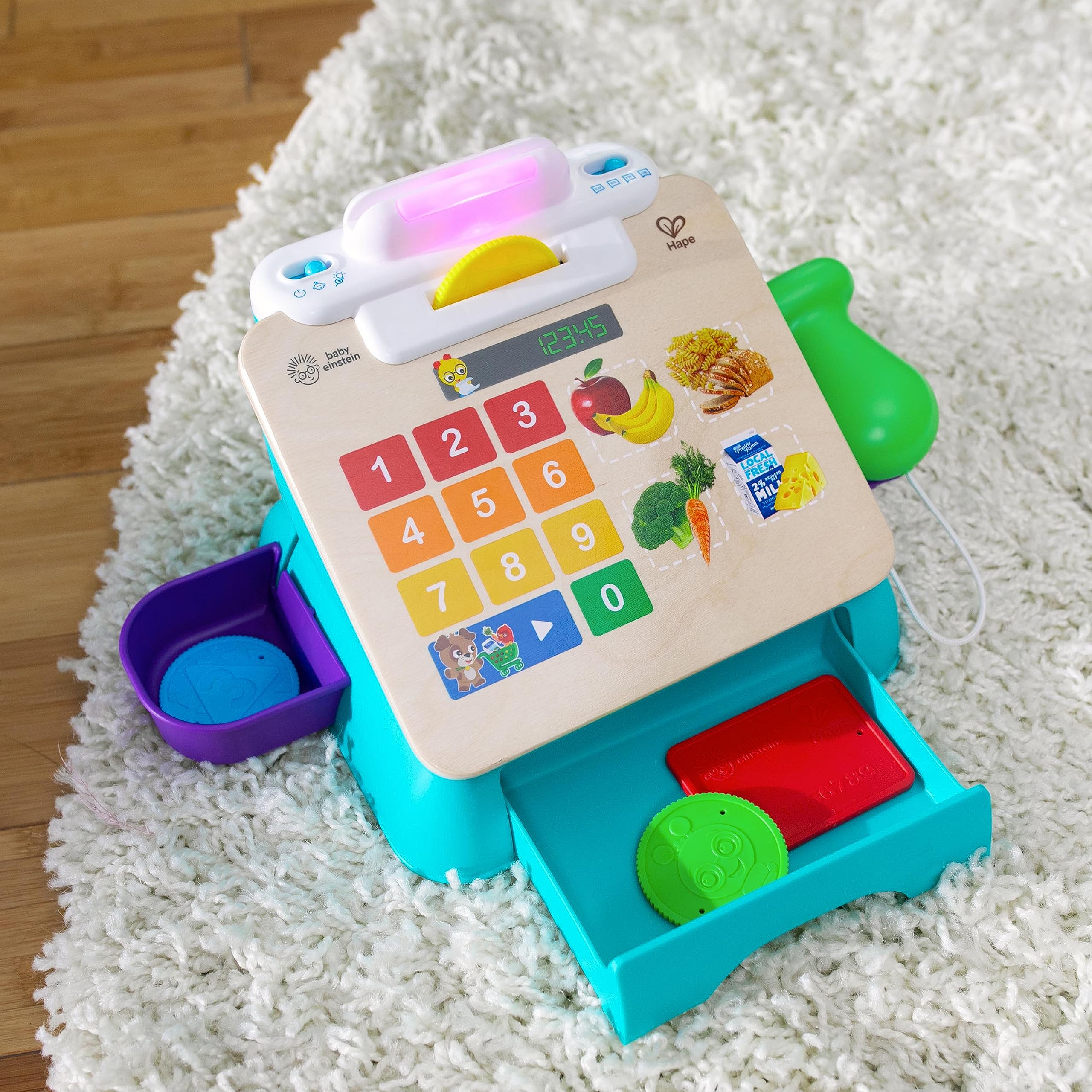 Baby Einstein + Hape Magic Touch Cash Register Pretend to Check Out Toy, z prawdziwymi dźwiękami i muzyką, dla dzieci w wieku od 9 miesięcy