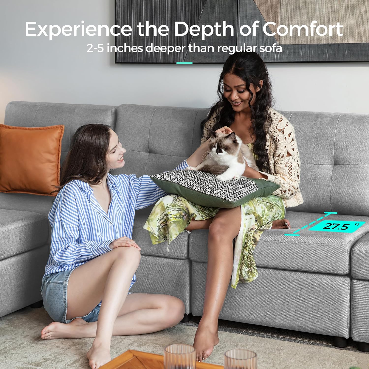 Two people relaxing on the deep seat sofa