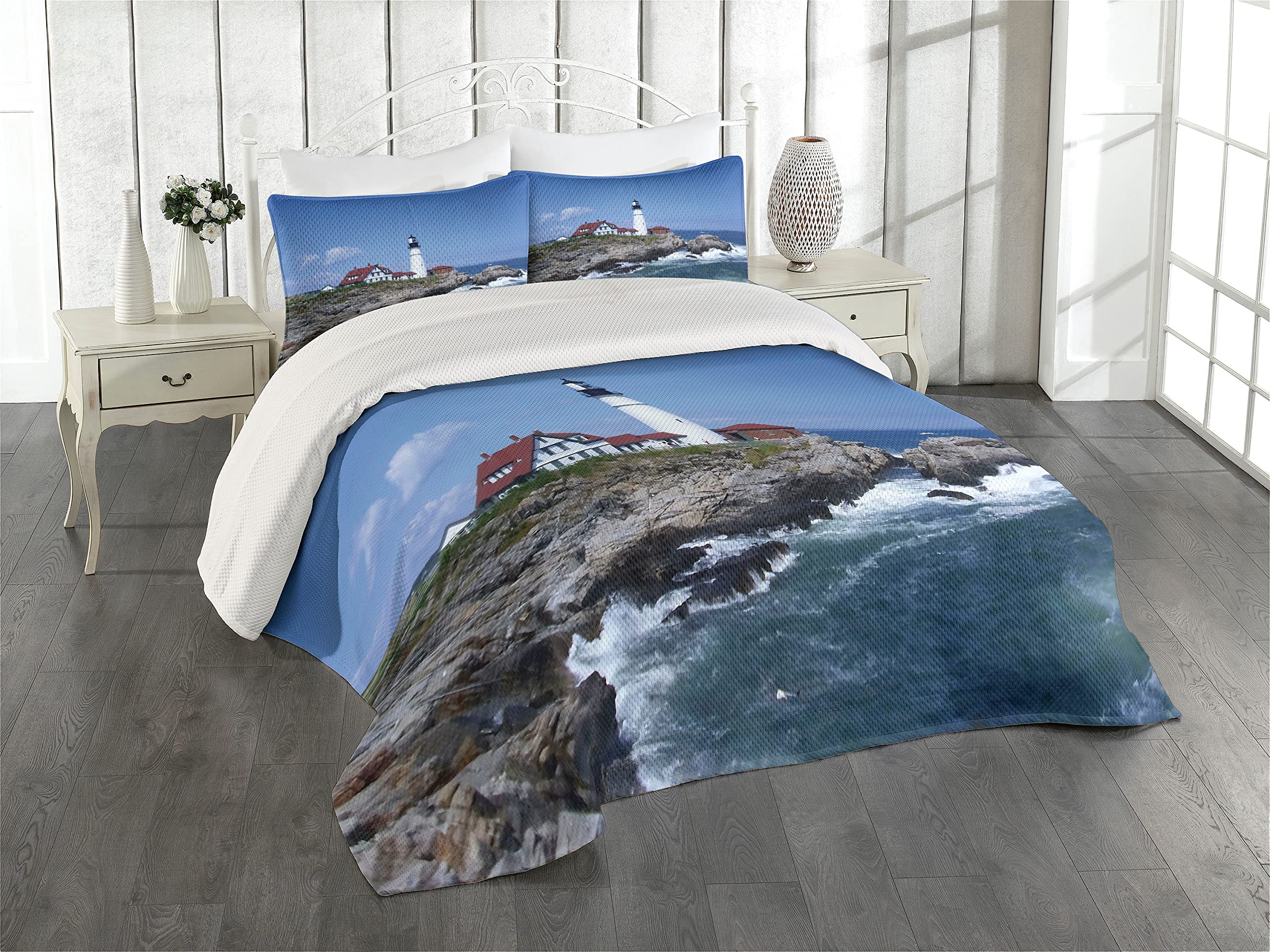 Ambesonne Landscape Coverlet, Marine Themed Photo with Lighthouse on Rocks and Wavy Sea Calm Sky Panorama, 3 Piece Decorative Quilted Bedspread Set with 2 Pillow Shams, King Size, Ice Blue