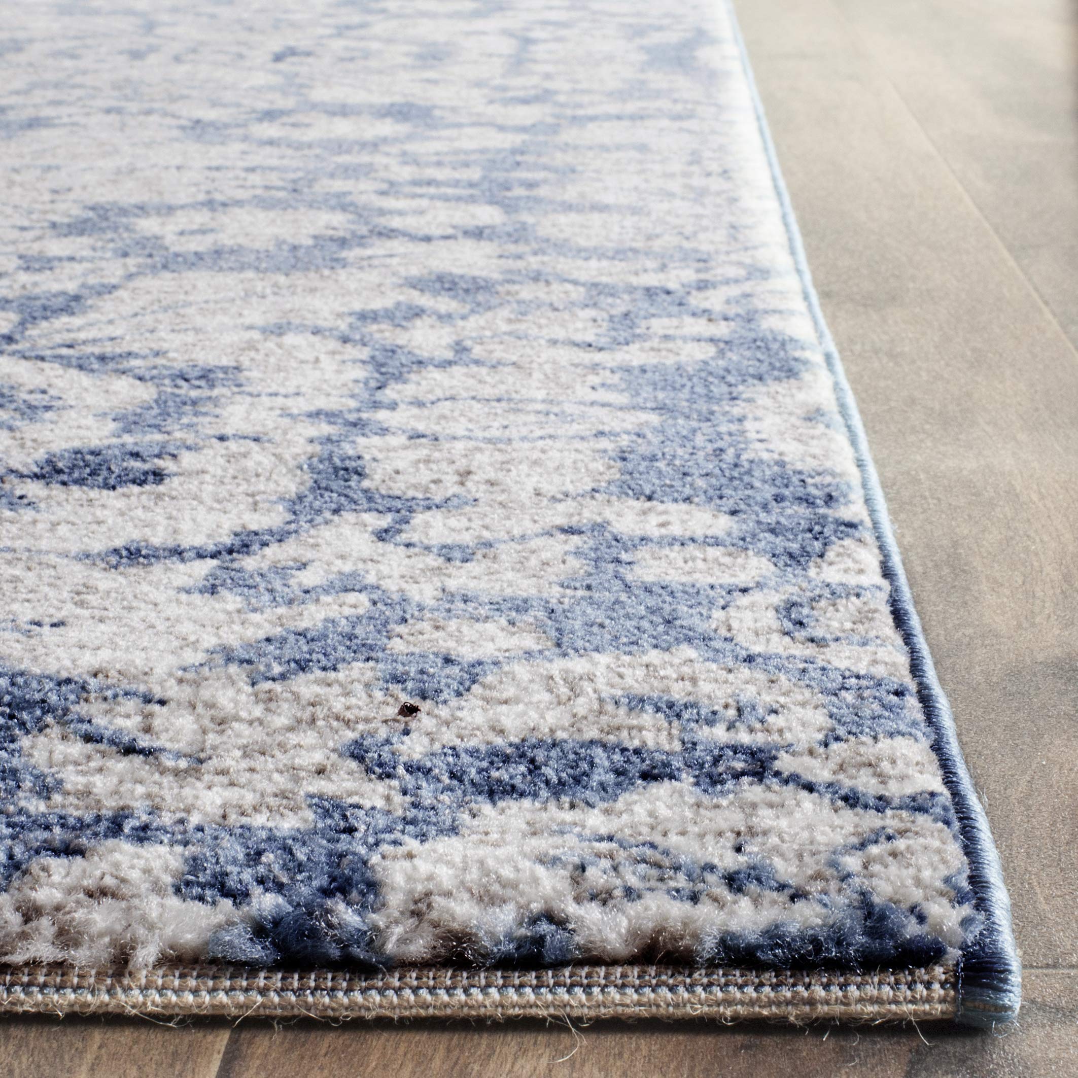 SAFAVIEH Tapis Traditionnel Pour Salon, Salle à manger, Chambre à coucher - Sofia Collection, Tapis à poil court, Bleu et beige, 122 X 170 cm