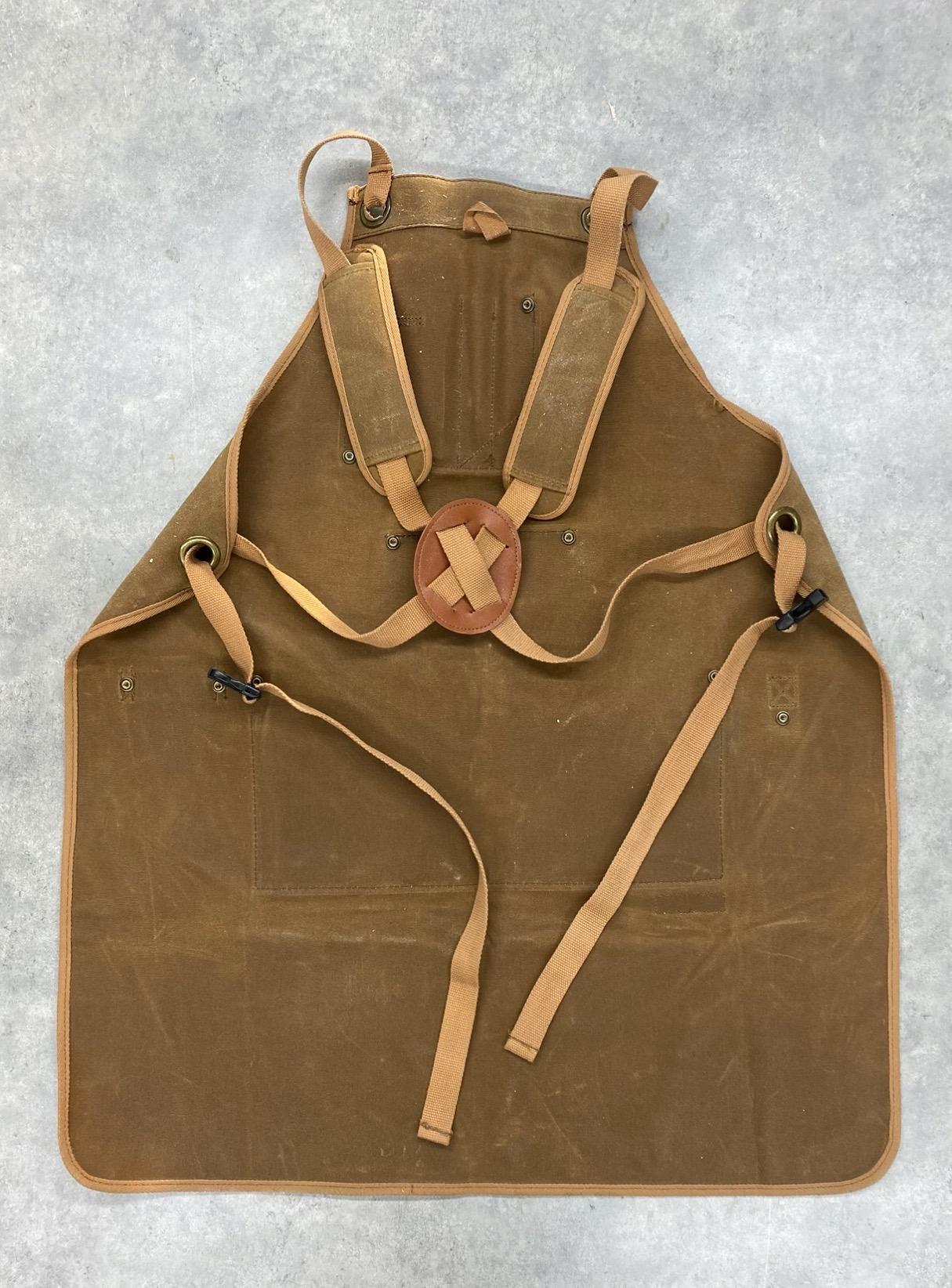 Briteree woodworking apron laid flat showing tool pockets and pencil slots