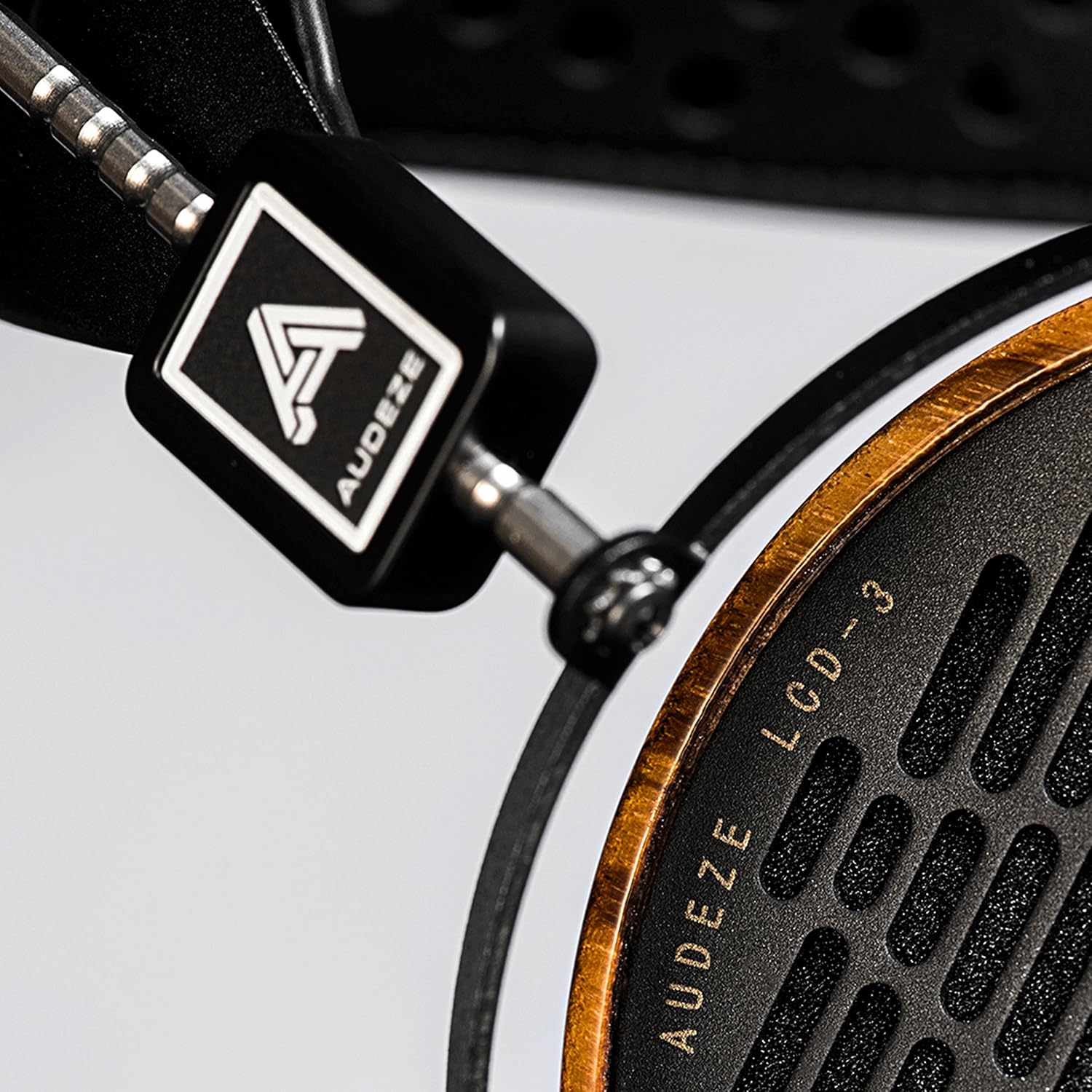 Close-up of Audeze LCD-3 wood ring with logo