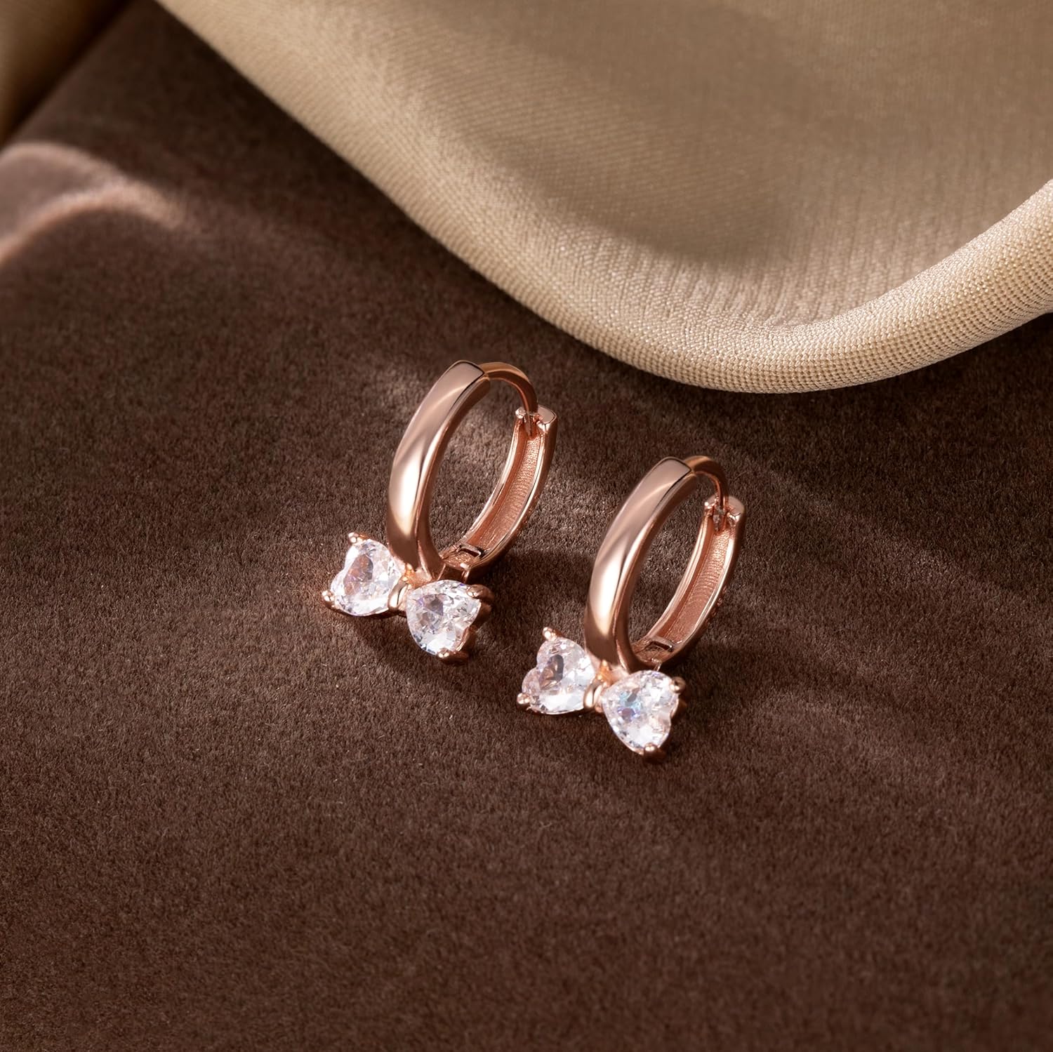 SLUYNZ Sterling Silver Love Bow Hoop Earrings for Women Teens CZ Bow Hoop Earrings Huggie - Image 4