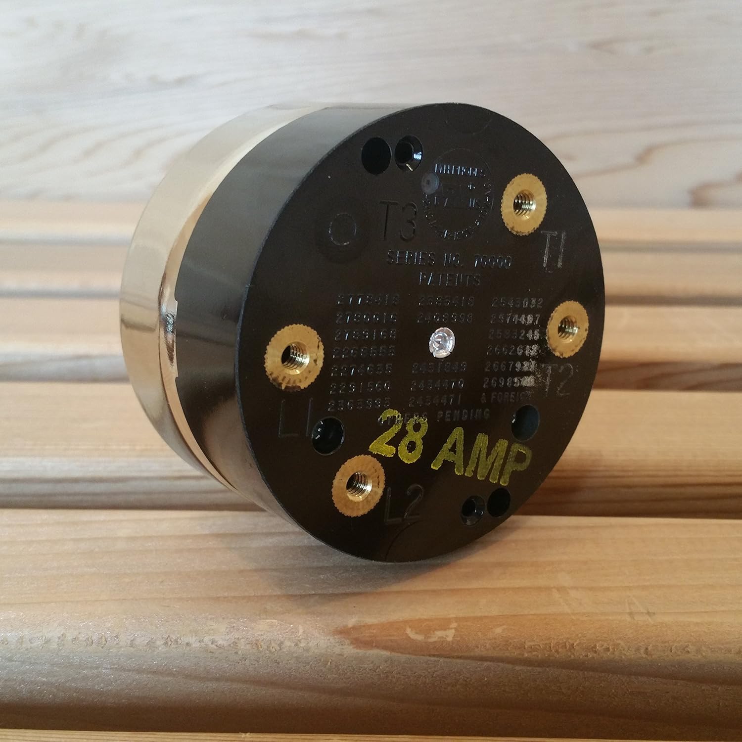 Rear view of the Harvia Finlandia 28 Amp 1 Hour Timer, showing the black plastic base with four brass-colored screw terminals and '28 AMP' clearly labeled.
