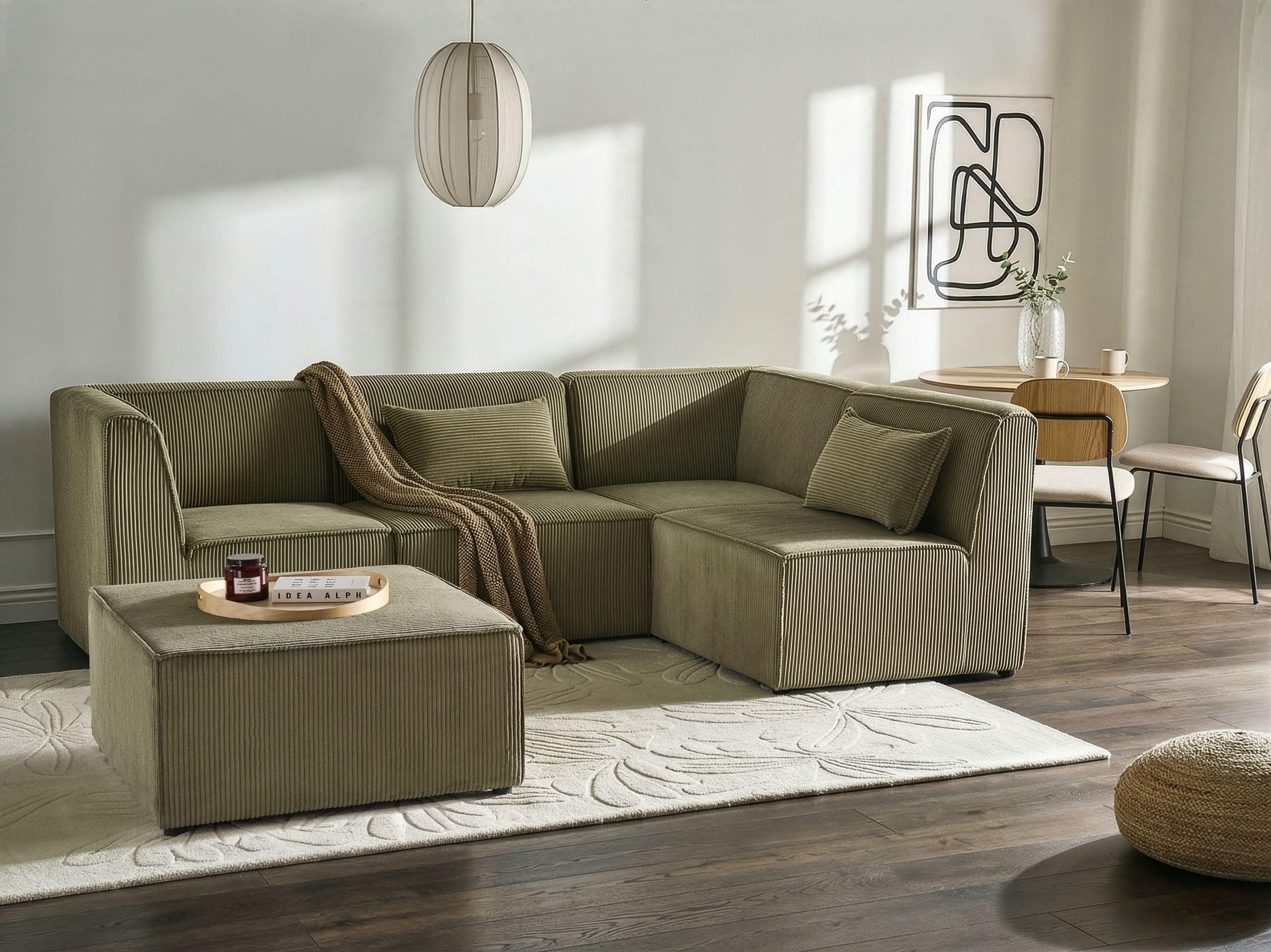 Sofa narożnik lewostronny modułowa 4-osobowa kanapa z otomaną sztruksowa zielony Lemvig