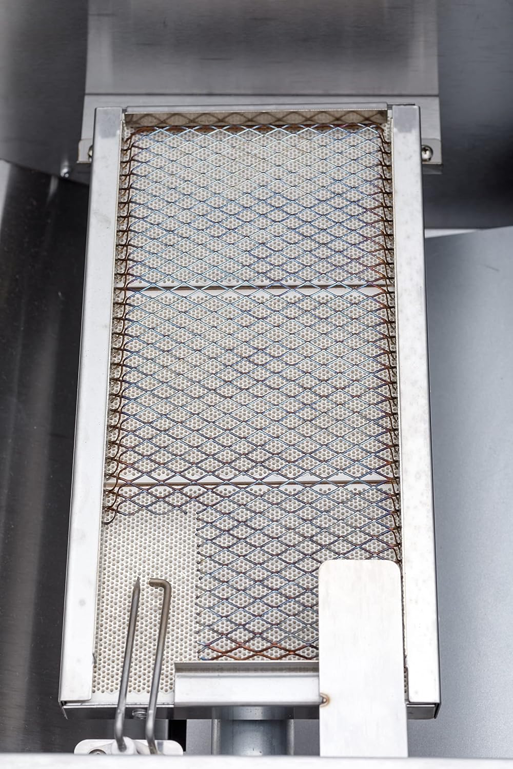 Detailed close-up of the infrared burner on the NXR side burner